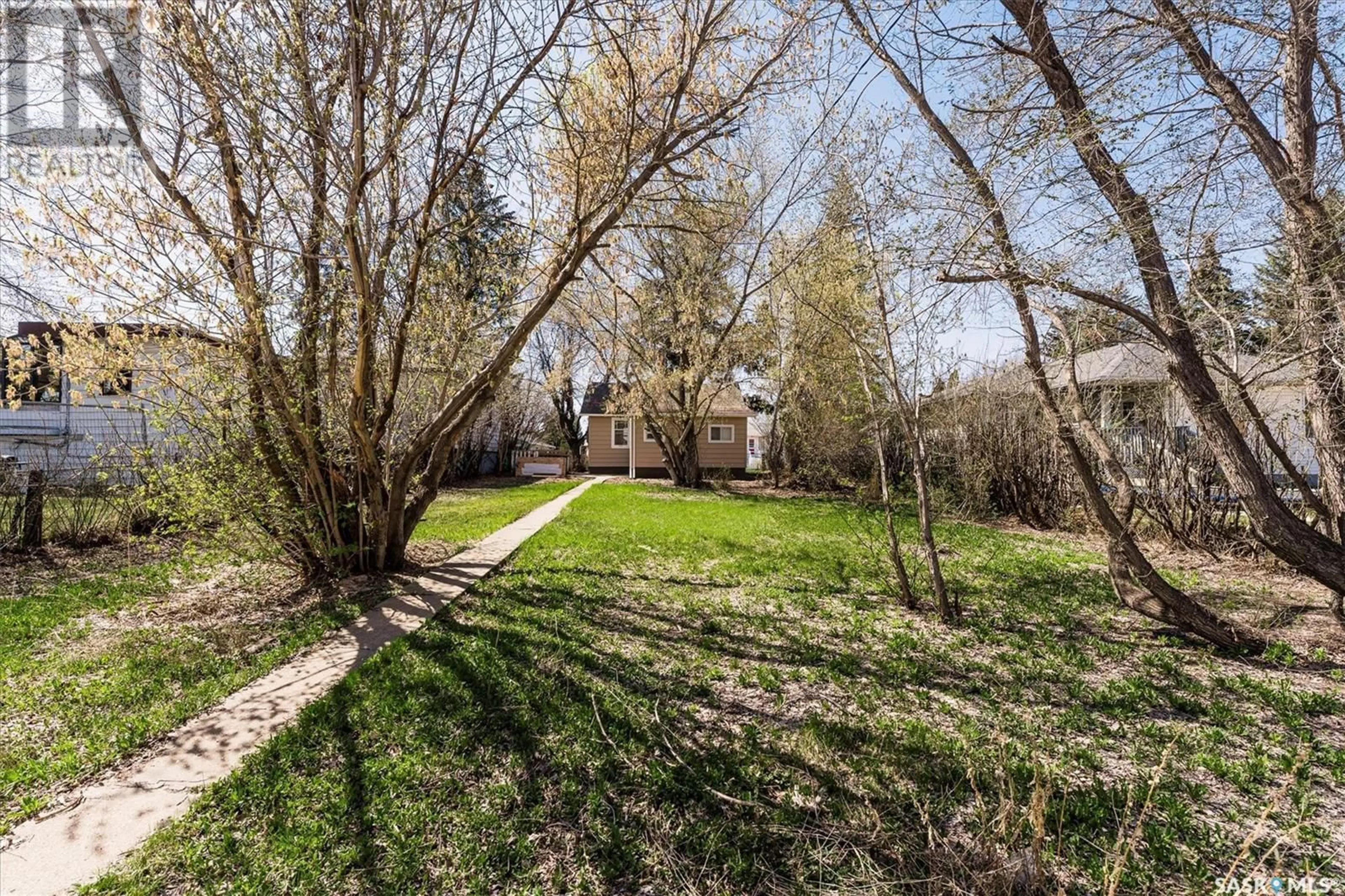 A pic from outside/outdoor area/front of a property/back of a property/a pic from drone, forest/trees view for 452 T AVENUE, Saskatoon Saskatchewan S7M3B2