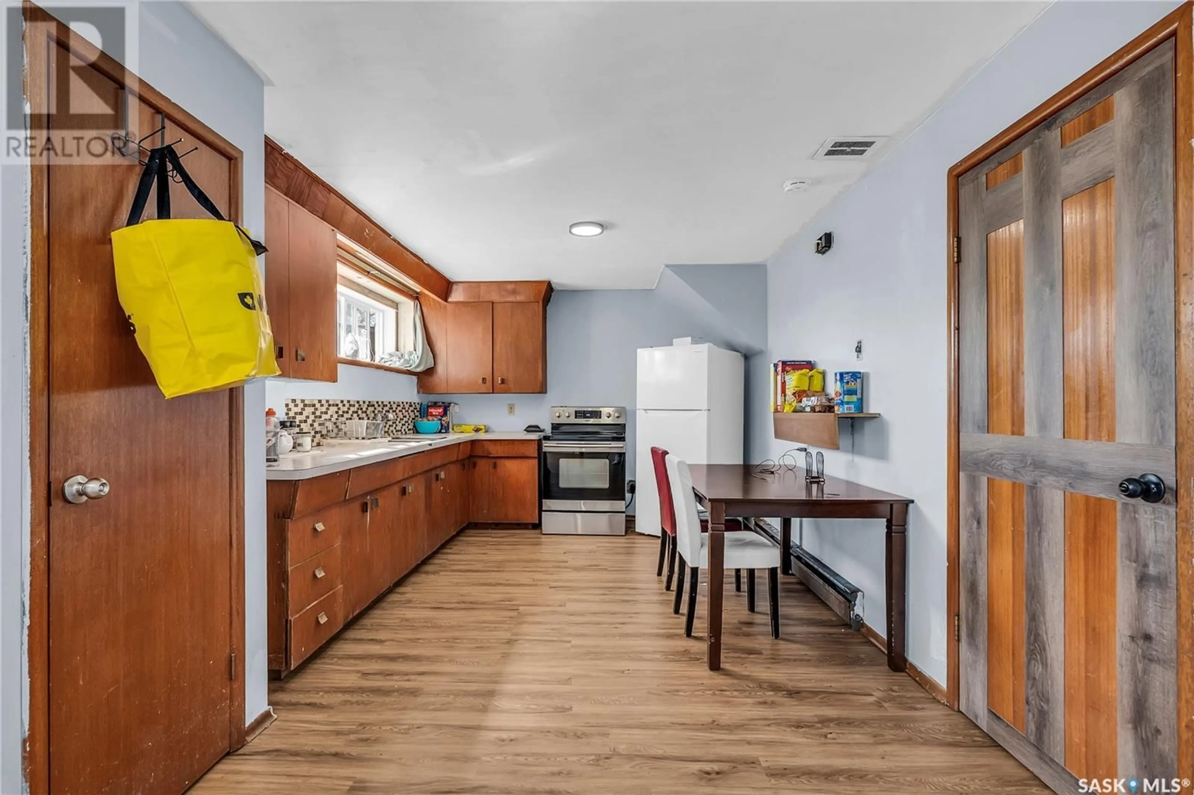 Open concept kitchen, unknown for 205 P AVENUE, Saskatoon Saskatchewan S7L2V6