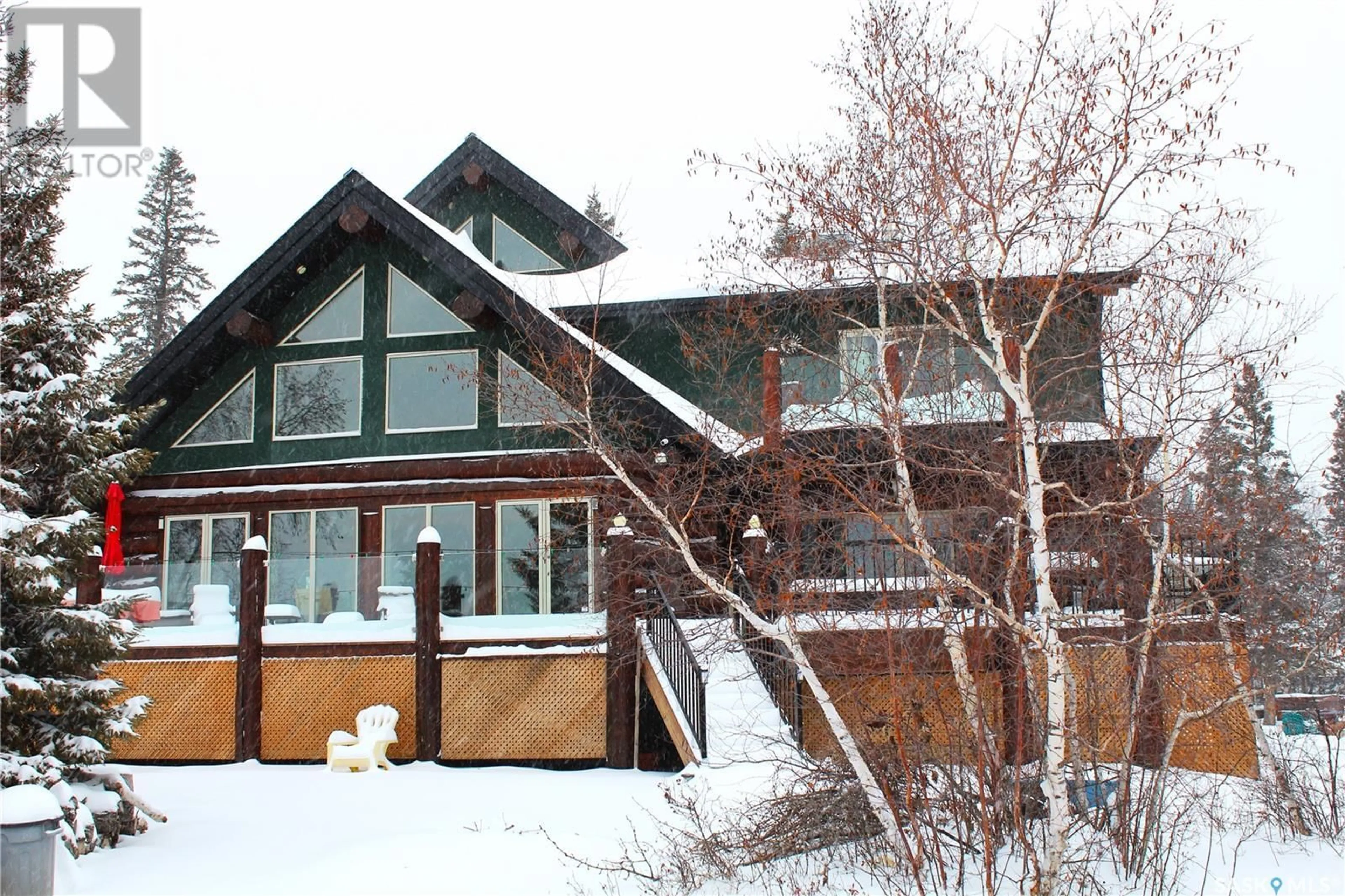 A pic from outside/outdoor area/front of a property/back of a property/a pic from drone, unknown for 105 JANICE PLACE, Emma Lake Saskatchewan S0J0N0