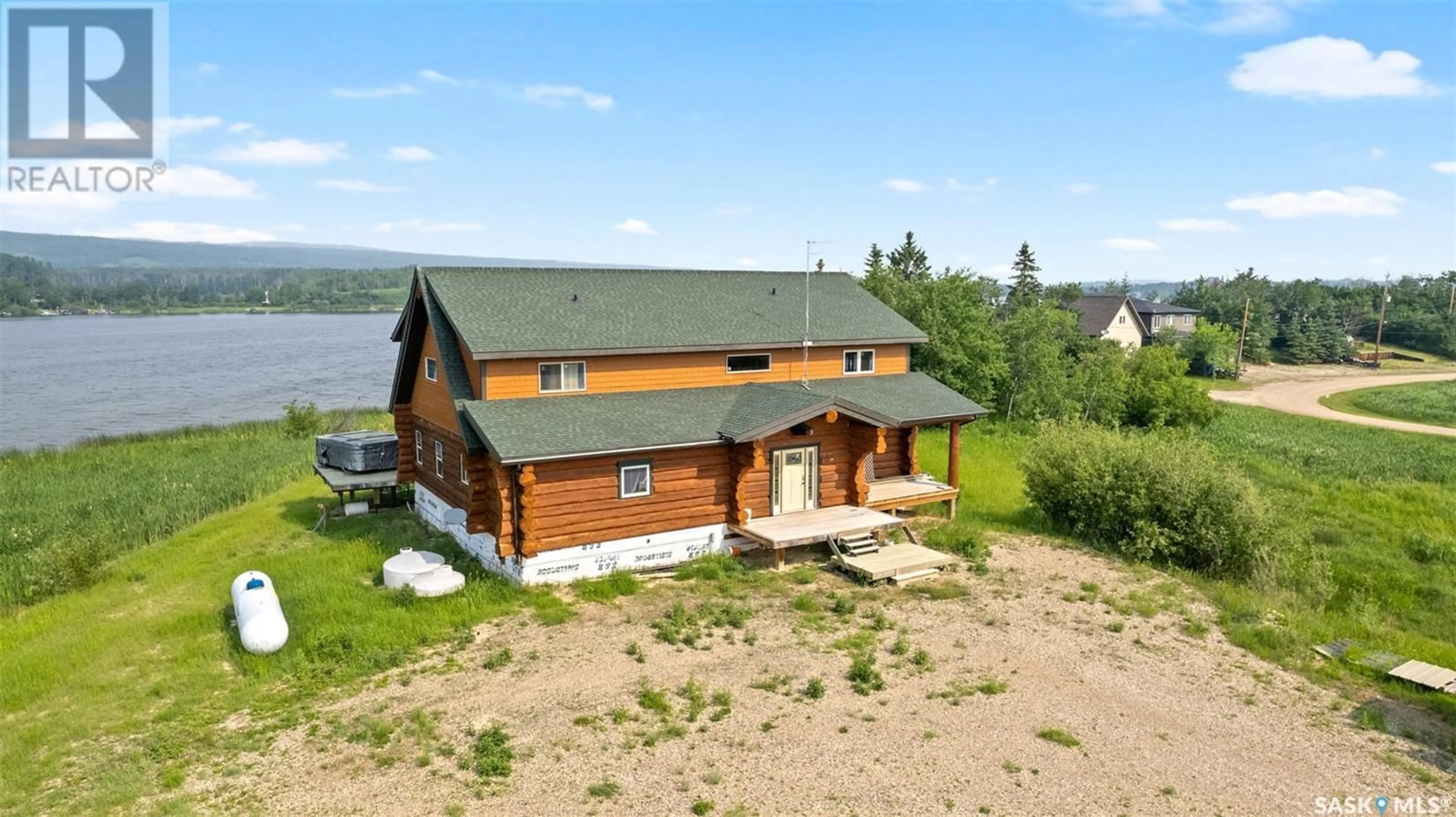 A pic from outside/outdoor area/front of a property/back of a property/a pic from drone, building for MARTIN'S LAKE SCENIC WATERFRONT LOG HOME, Leask Rm No. 464 Saskatchewan S0J1M0