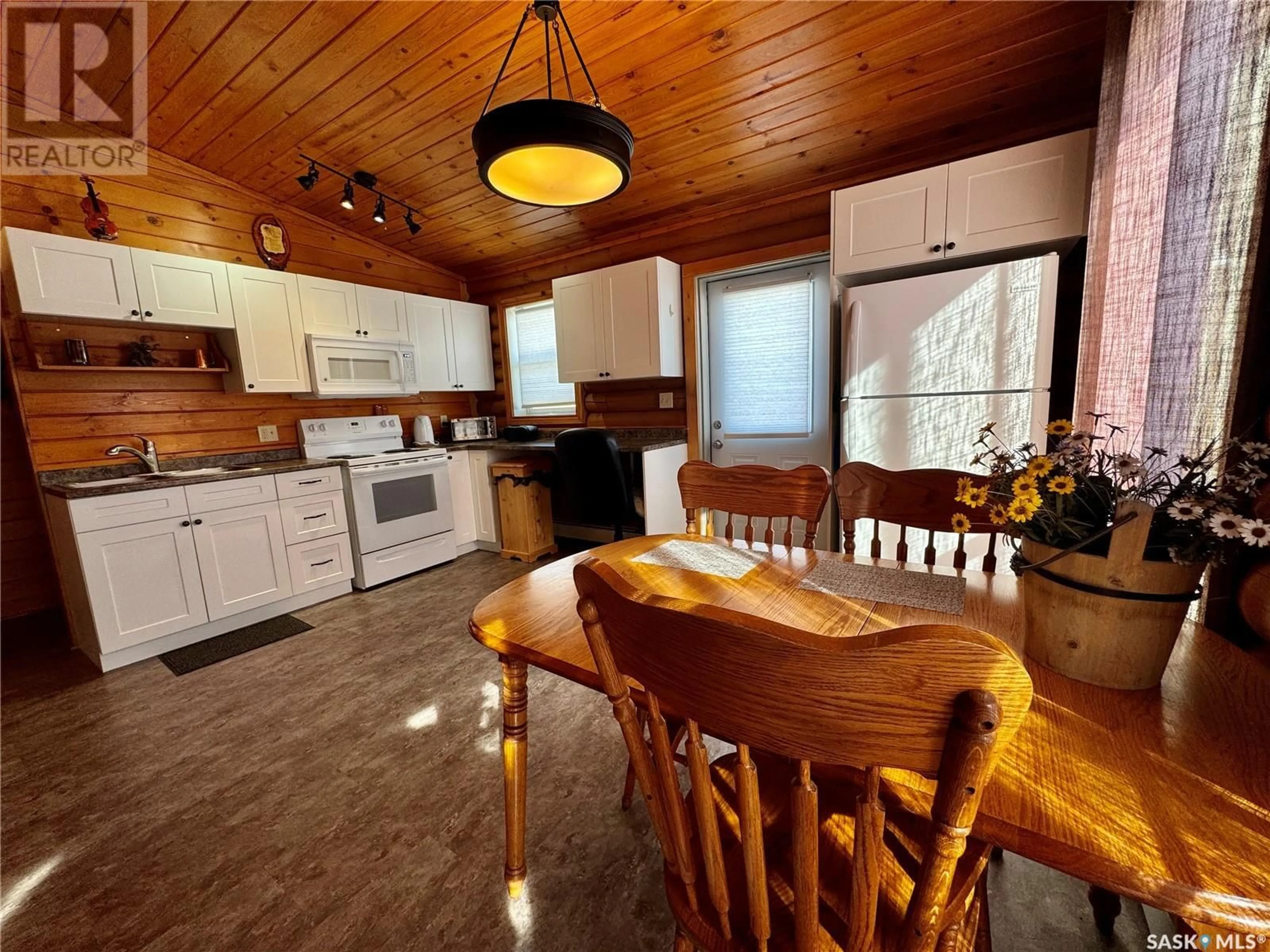 Open concept kitchen, wood/laminate floor for 7 SPIRITWOOD LANE, Good Lake Rm No. 274 Saskatchewan S0A0L1