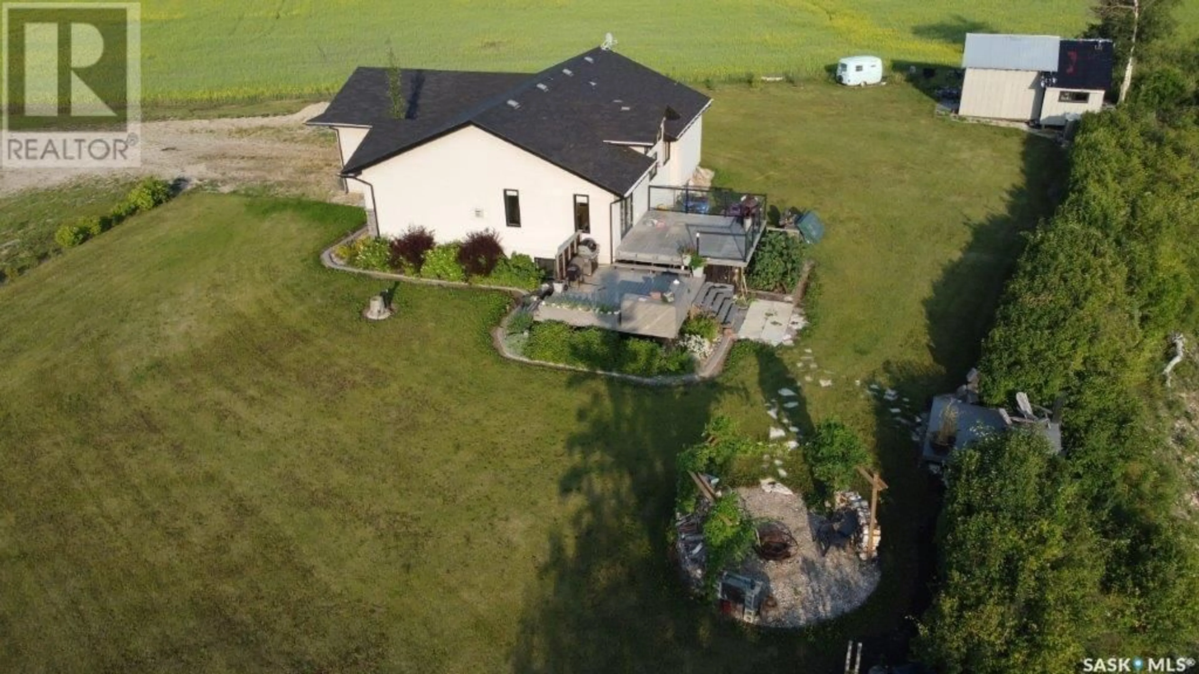 A pic from outside/outdoor area/front of a property/back of a property/a pic from drone, building for 15 ACRES ETOMAMI, Hudson Bay Rm No. 394 Saskatchewan S0E0Y0