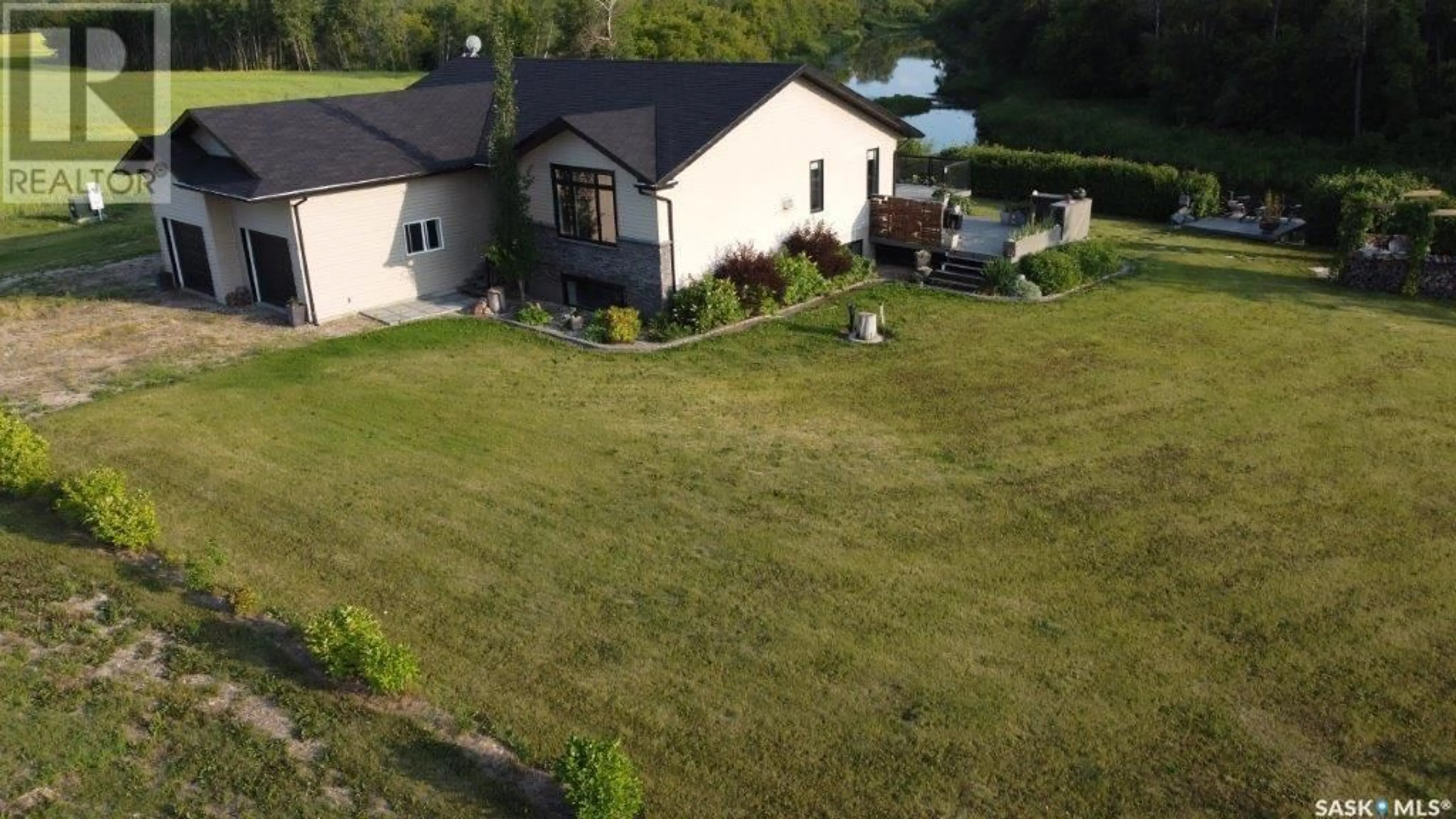 A pic from outside/outdoor area/front of a property/back of a property/a pic from drone, water/lake/river/ocean view for 15 ACRES ETOMAMI, Hudson Bay Rm No. 394 Saskatchewan S0E0Y0