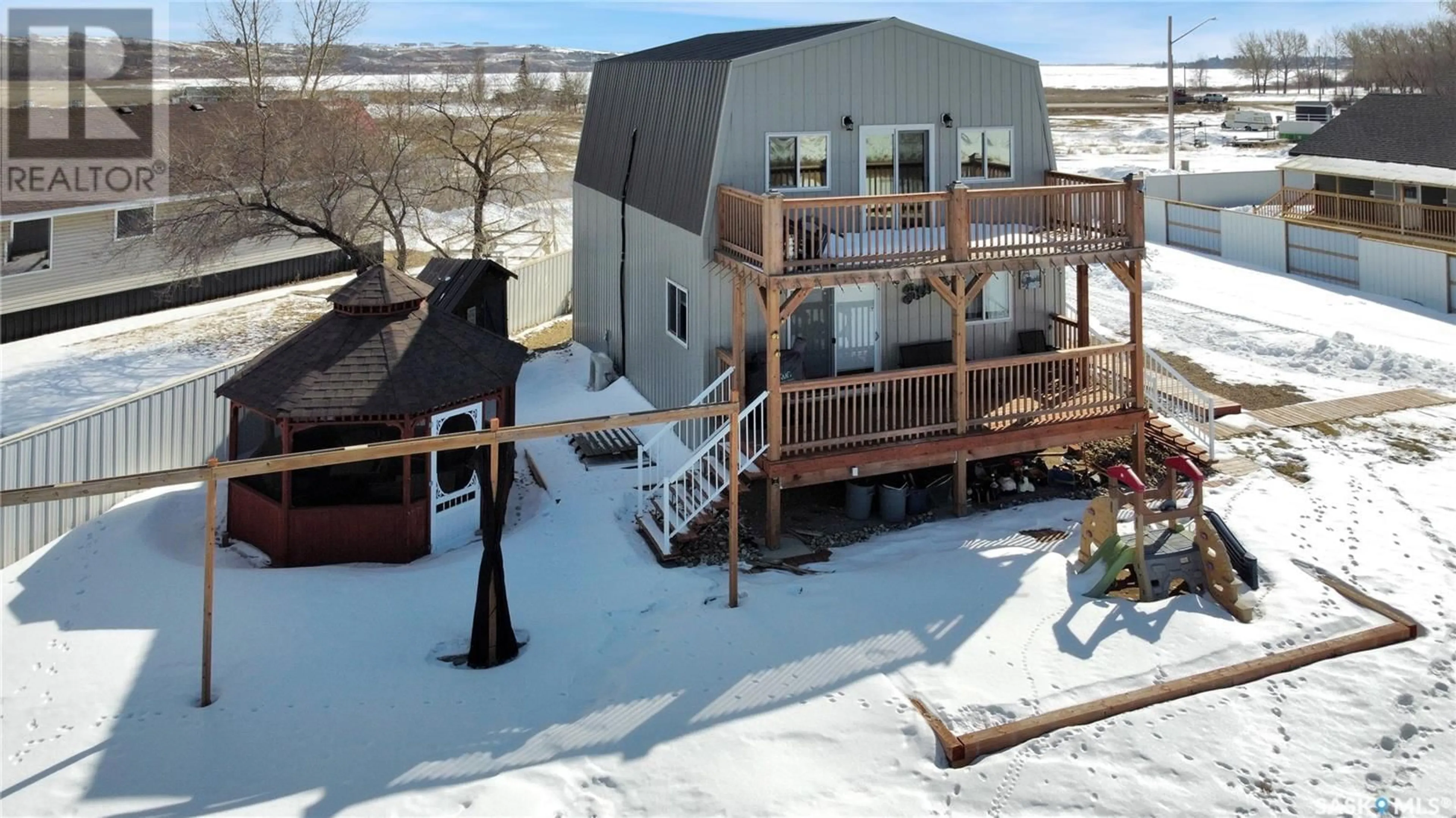 A pic from outside/outdoor area/front of a property/back of a property/a pic from drone, mountain view for 130 MCLENNAN DRIVE, Cochin Saskatchewan S0M0L0