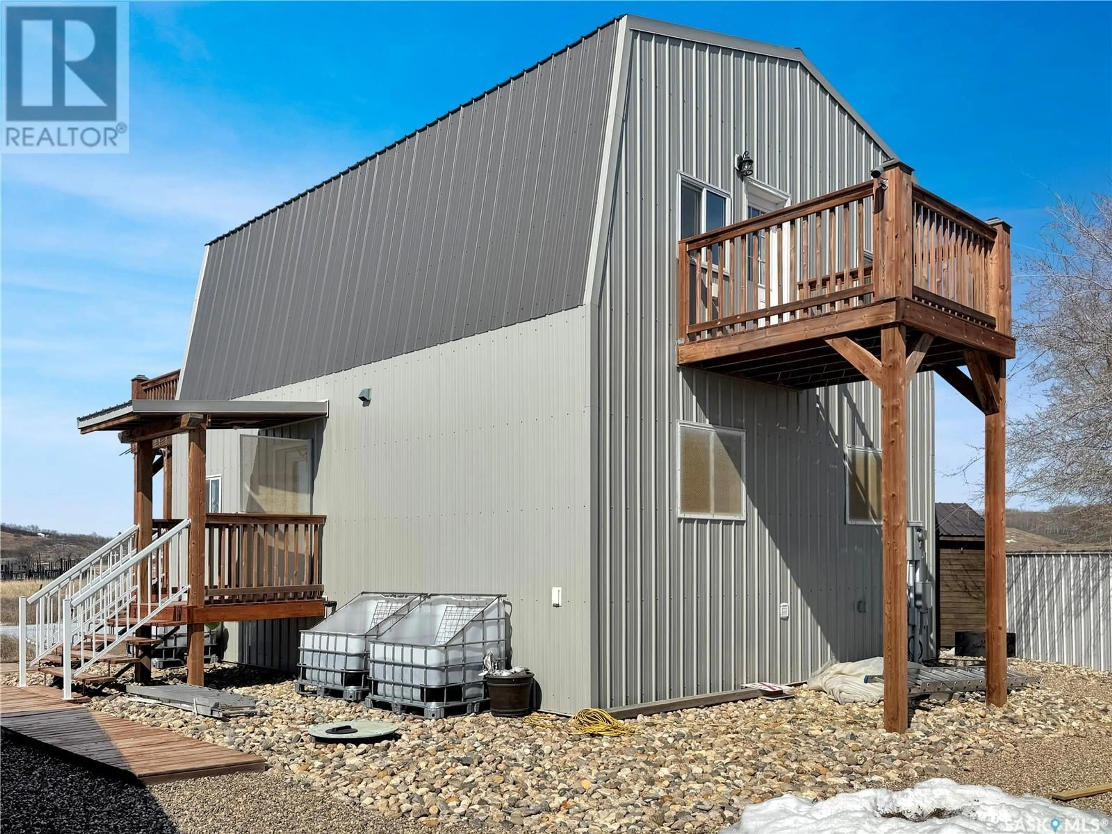 Home with vinyl exterior material, building for 130 MCLENNAN DRIVE, Cochin Saskatchewan S0M0L0