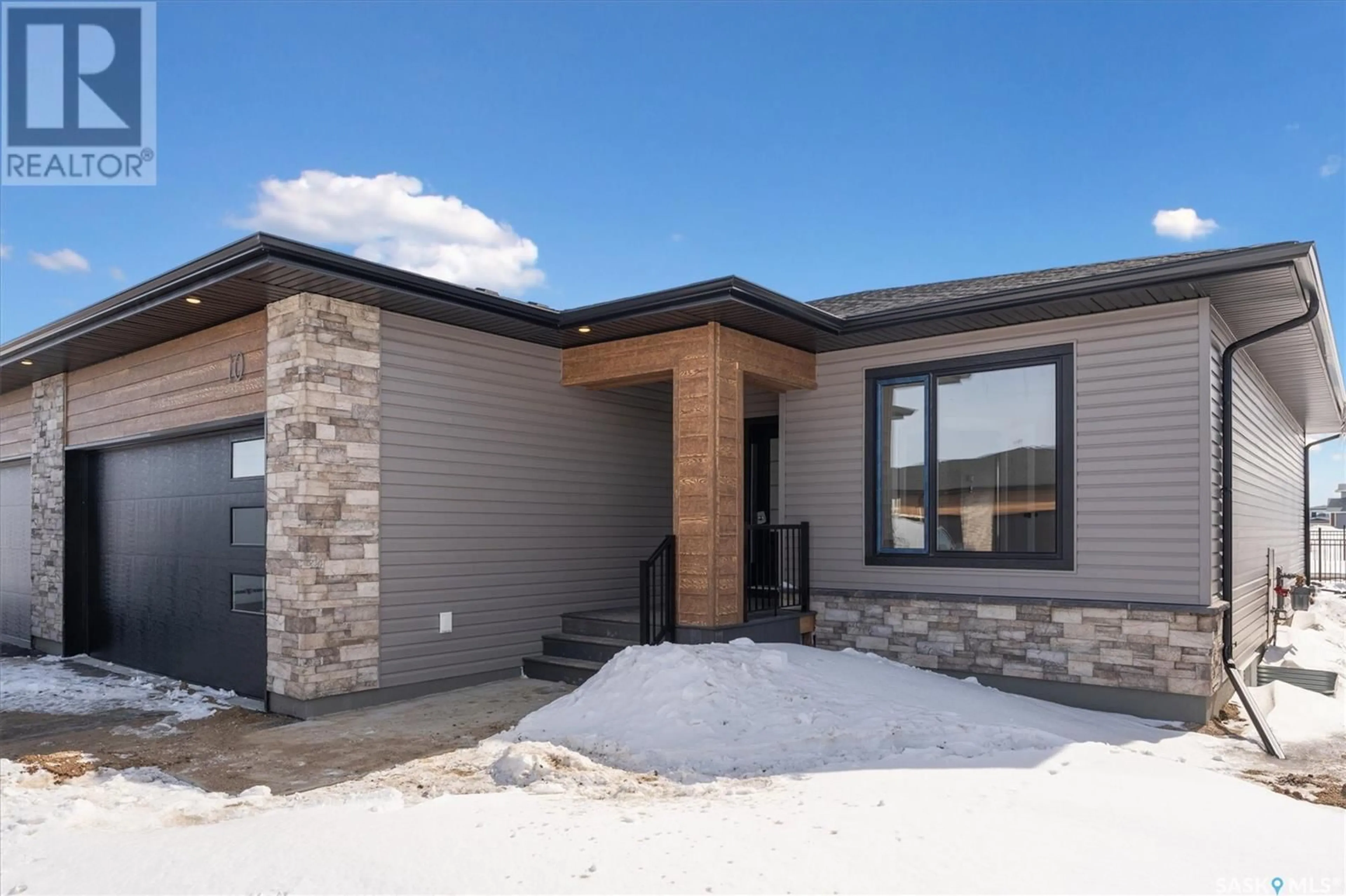 Home with brick exterior material, street for 515 - 10 DELAINEY ROAD, Saskatoon Saskatchewan S7V1V5