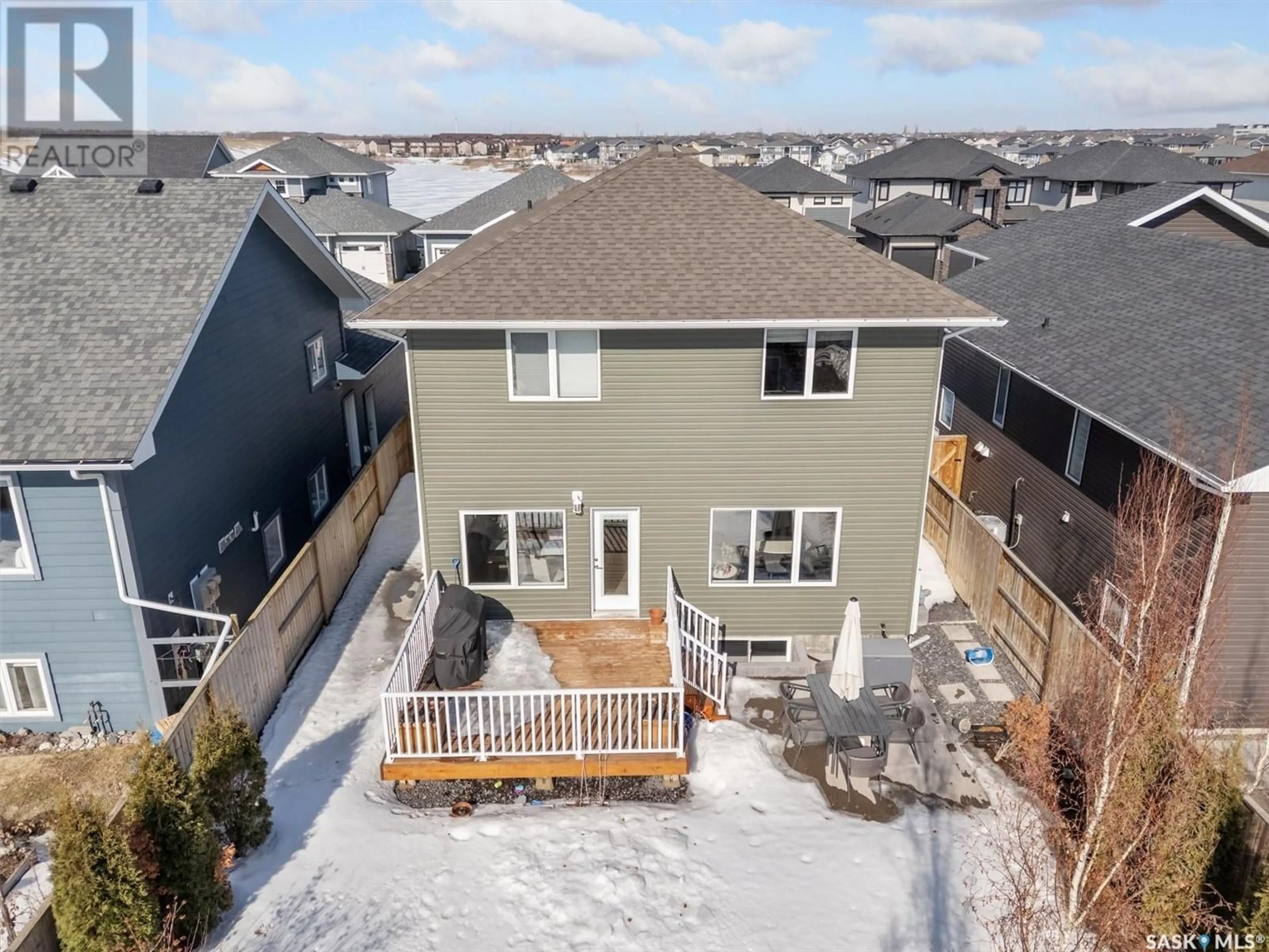 A pic from outside/outdoor area/front of a property/back of a property/a pic from drone, unknown for 819 PRINGLE COVE, Saskatoon Saskatchewan S7T1C9