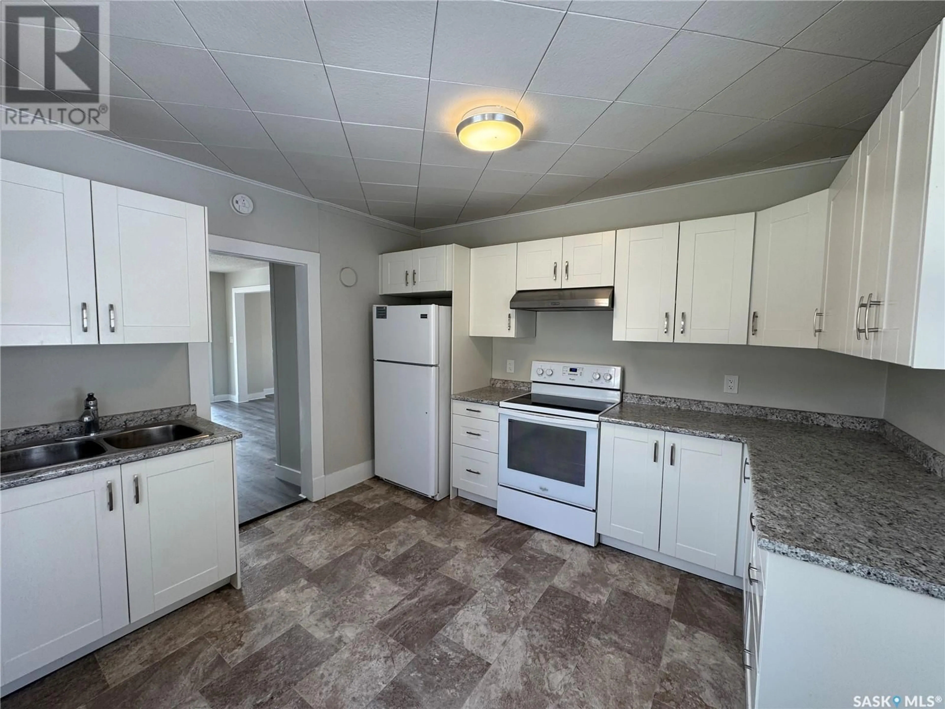 Standard kitchen, unknown for 305 3RD AVENUE, Biggar Saskatchewan S0K0M0