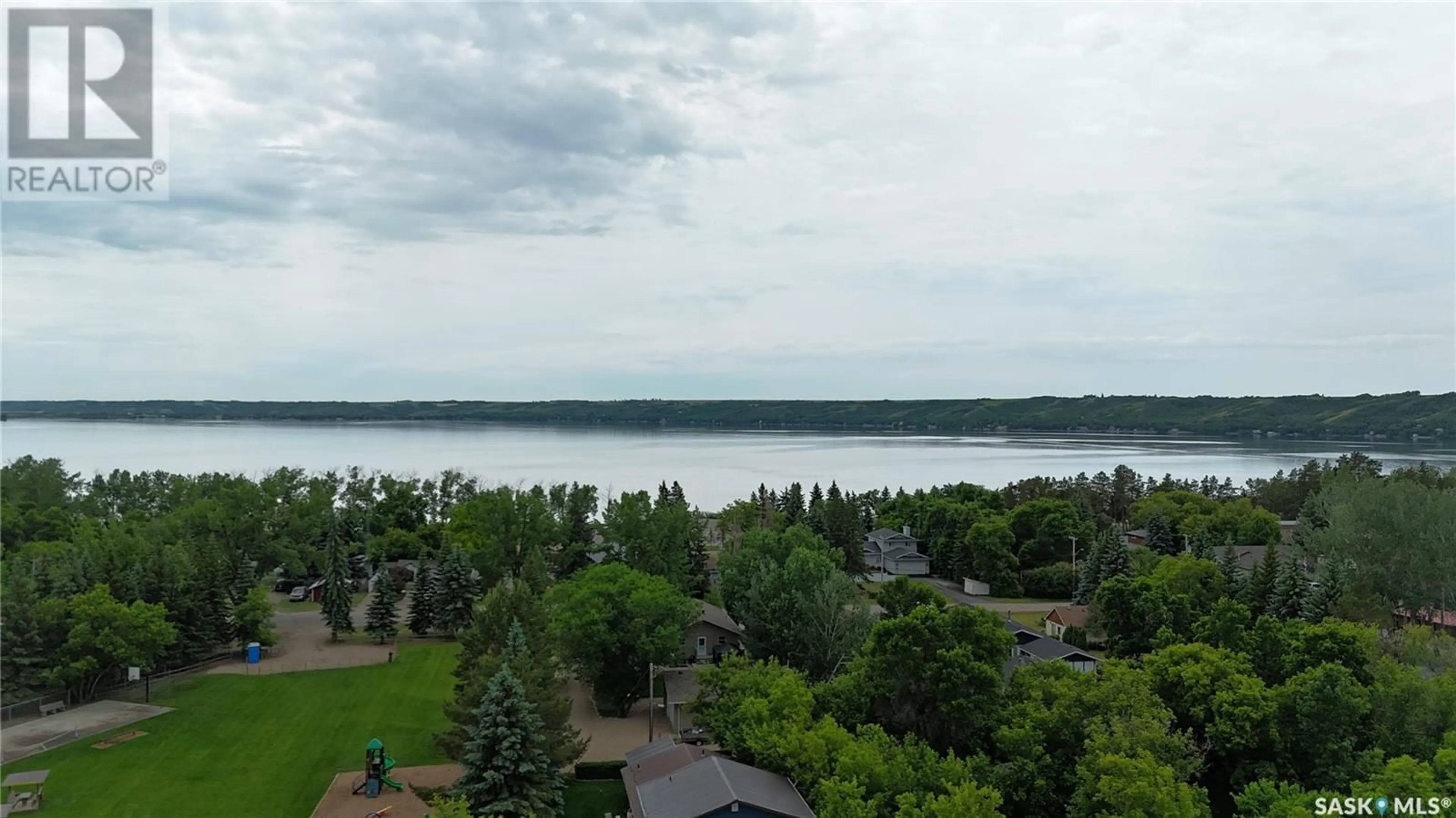 A pic from outside/outdoor area/front of a property/back of a property/a pic from drone, water/lake/river/ocean view for 6 PINE STREET, Katepwa Beach Saskatchewan S0G2Y0