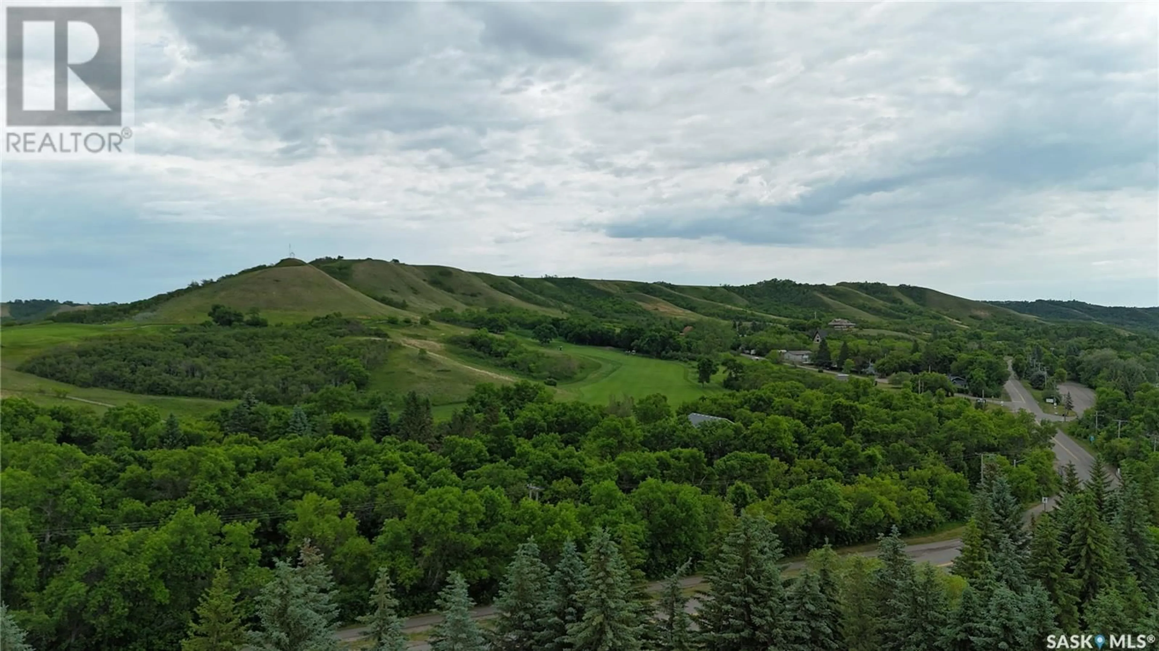 A pic from outside/outdoor area/front of a property/back of a property/a pic from drone, forest/trees view for 6 PINE STREET, Katepwa Beach Saskatchewan S0G2Y0
