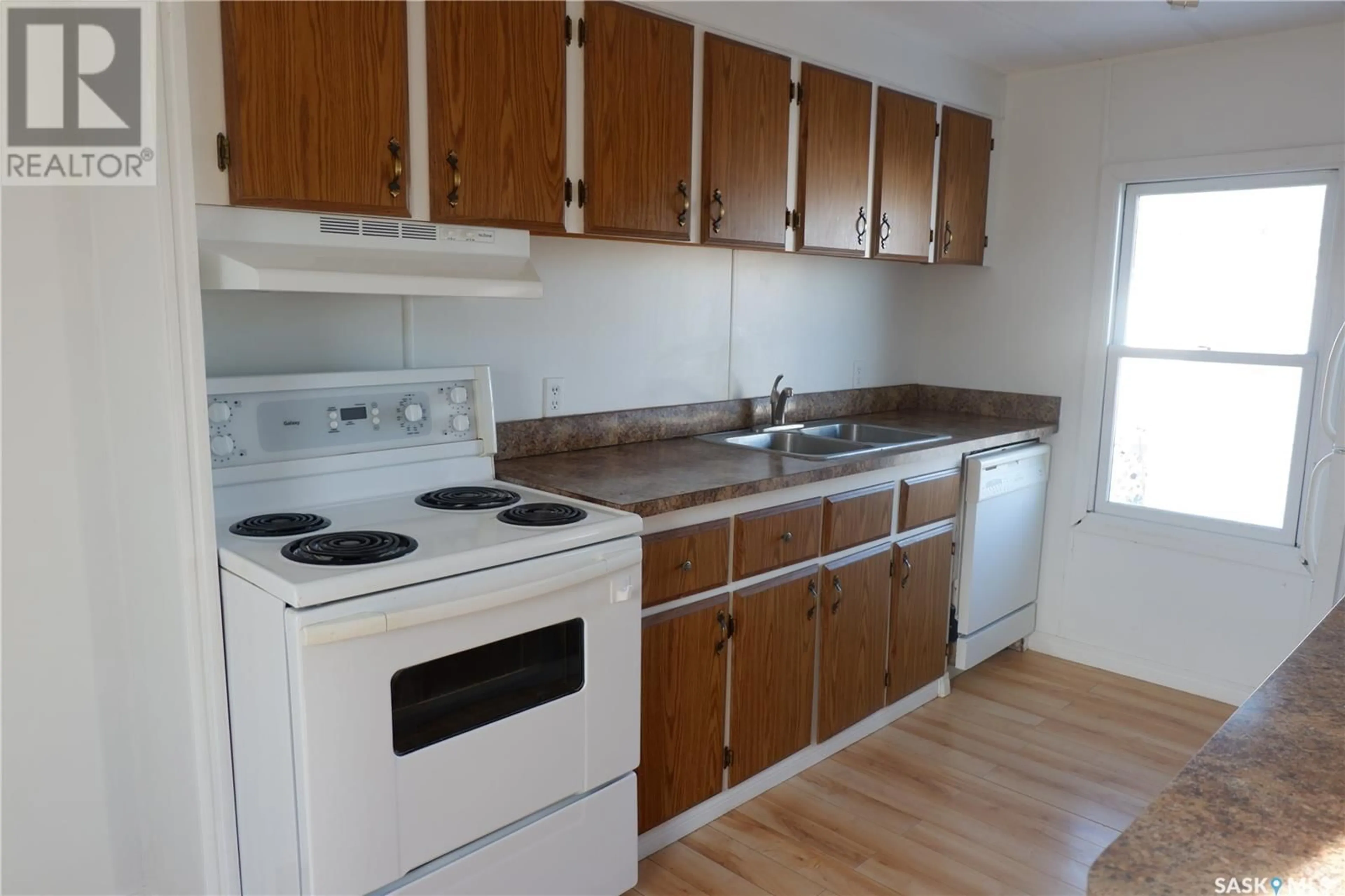Standard kitchen, wood/laminate floor for 52 SUNRISE ESTATES, Assiniboia Saskatchewan S0H0B0