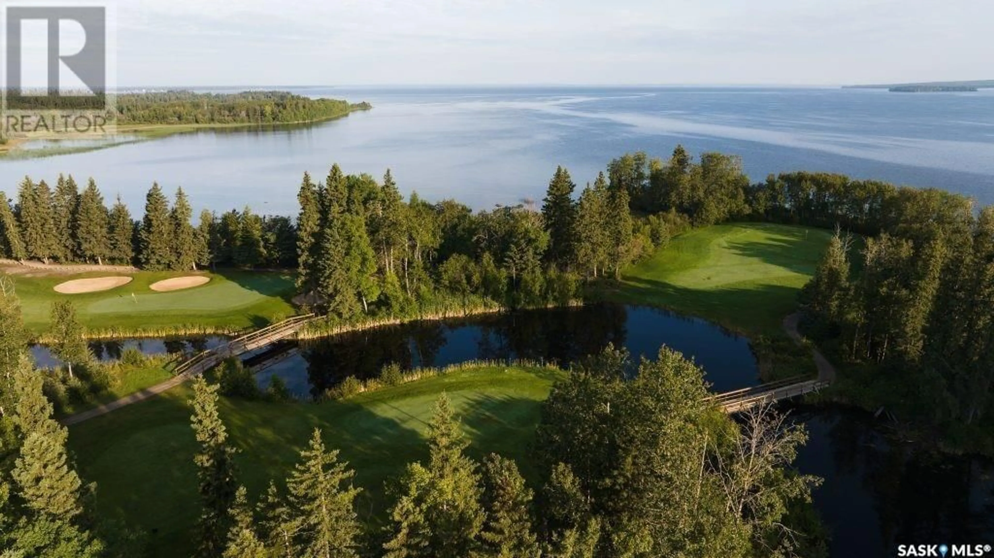 A pic from outside/outdoor area/front of a property/back of a property/a pic from drone, water/lake/river/ocean view for 100 RUMBERGER ROAD, Candle Lake Saskatchewan S0J3E0