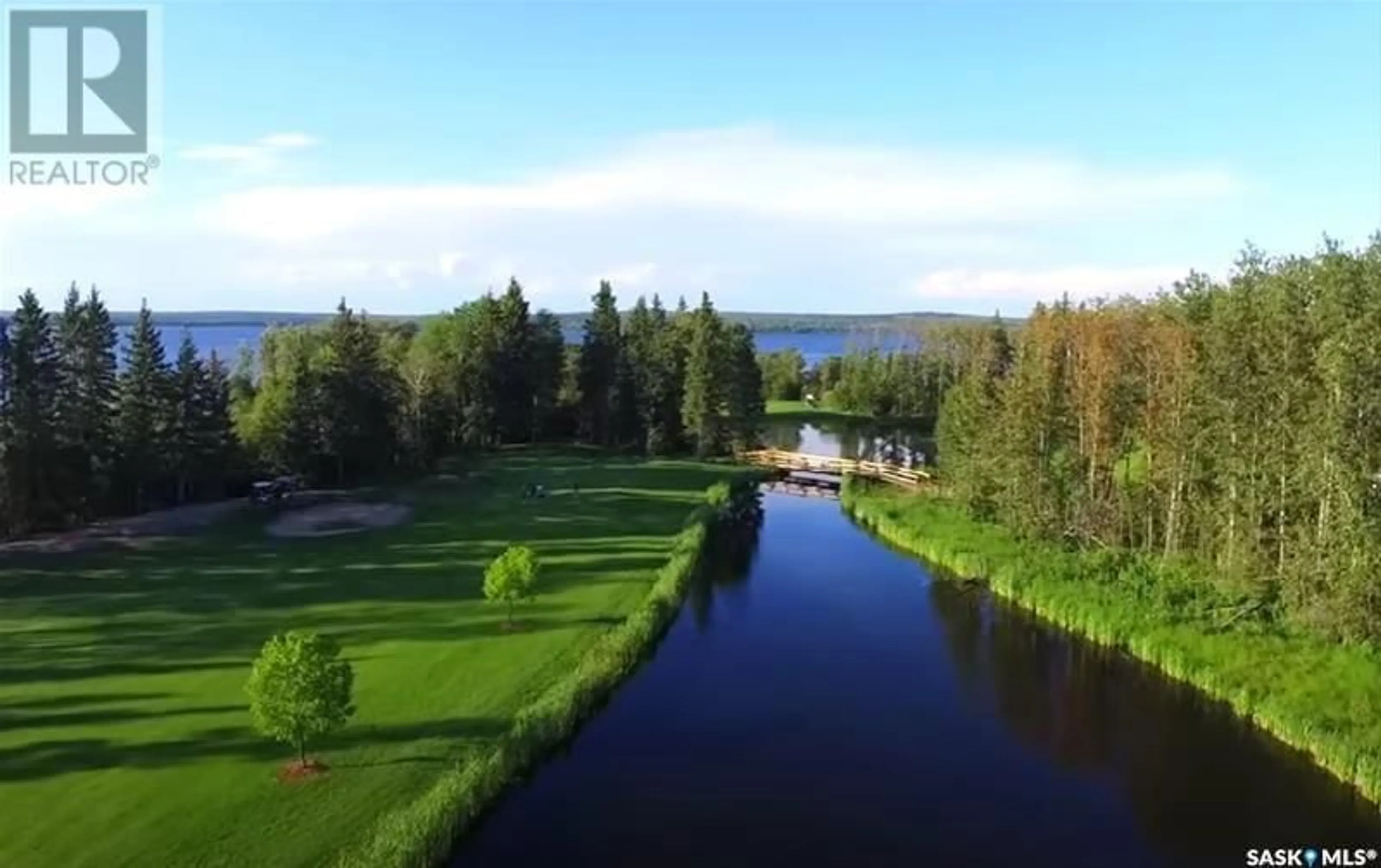 A pic from outside/outdoor area/front of a property/back of a property/a pic from drone, water/lake/river/ocean view for 100 RUMBERGER ROAD, Candle Lake Saskatchewan S0J3E0