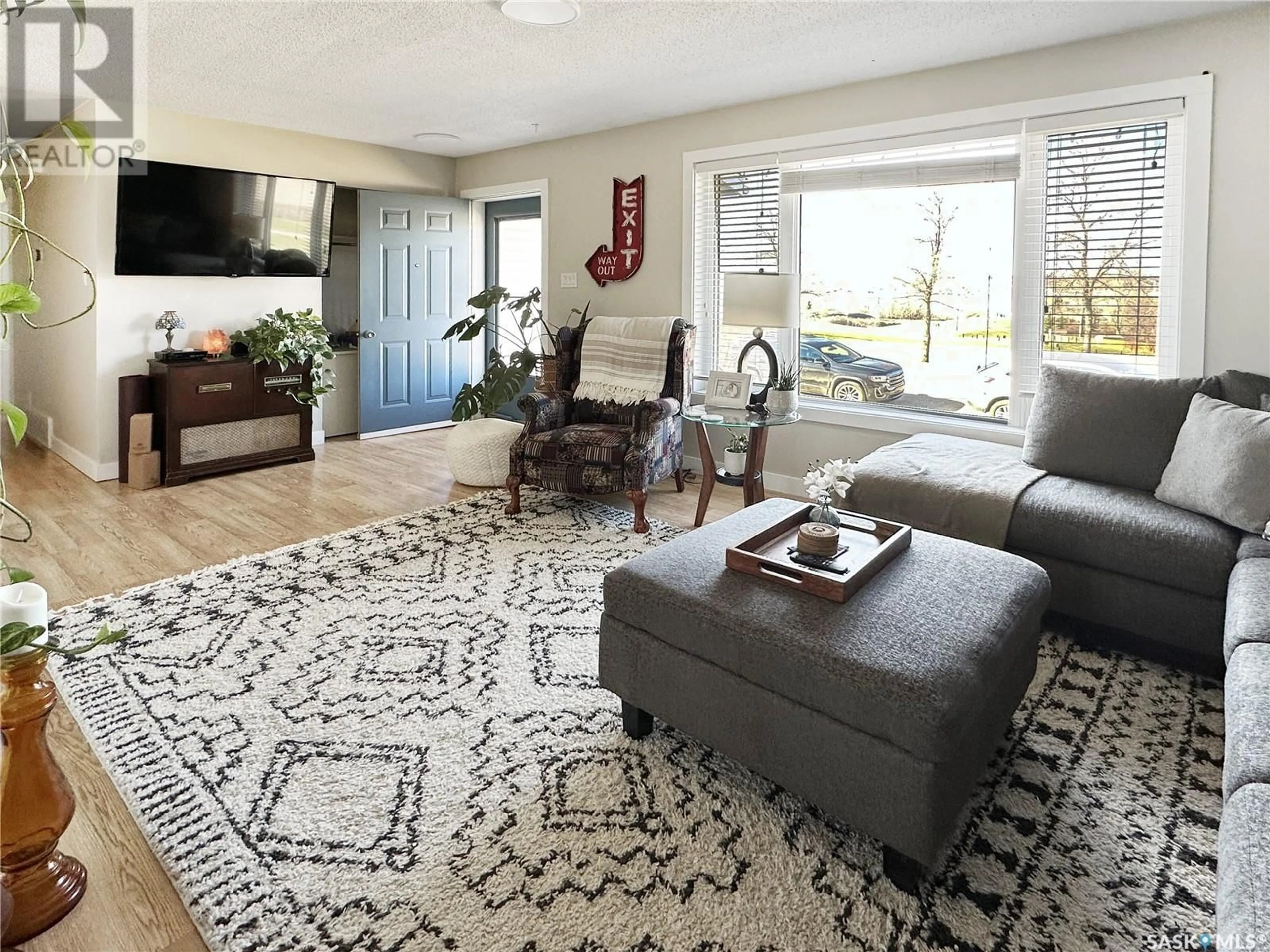 Living room with furniture, unknown for 60 AITKEN PLACE, Swift Current Saskatchewan S9H4H4