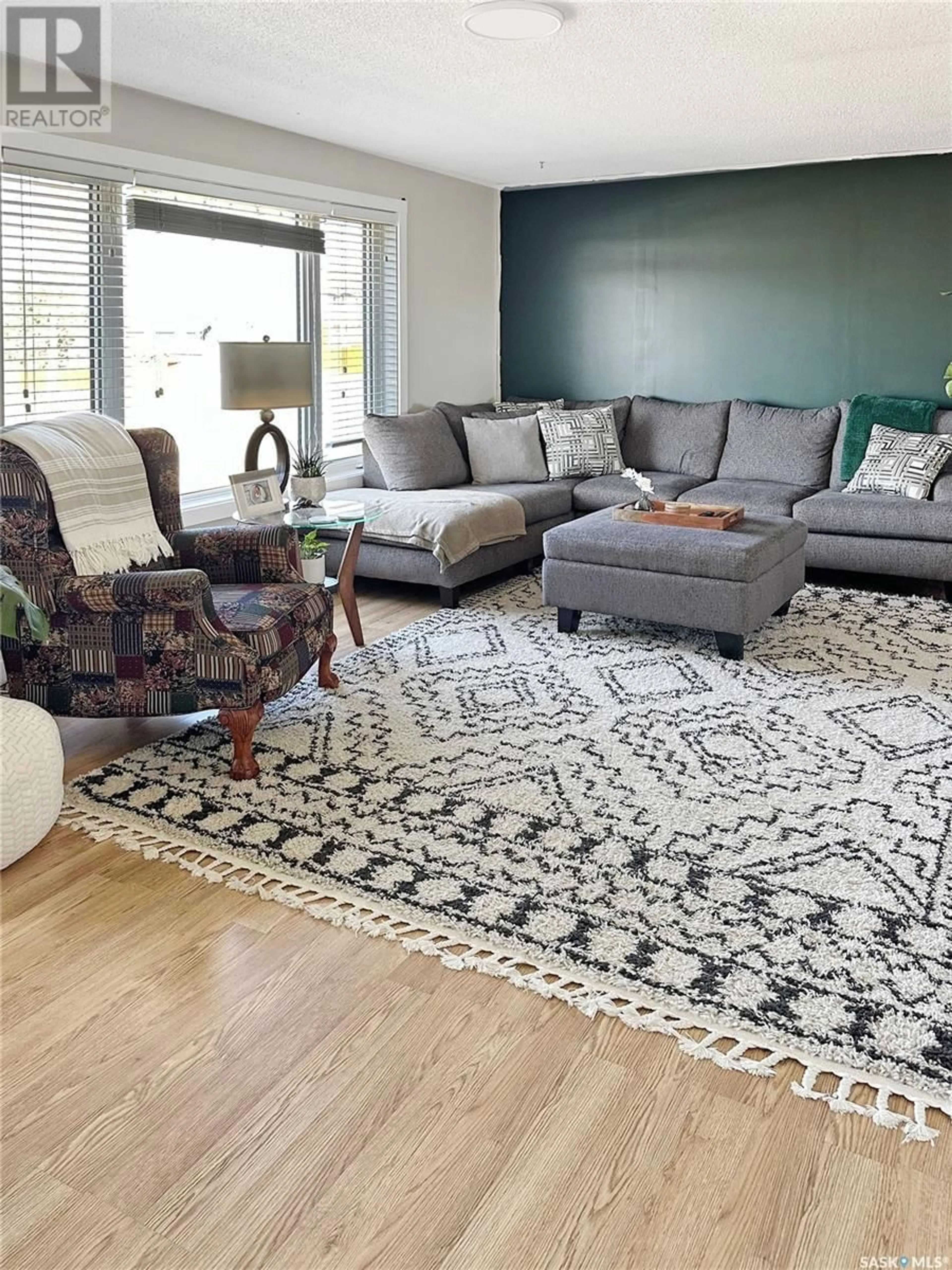 Living room with furniture, carpet floor for 60 AITKEN PLACE, Swift Current Saskatchewan S9H4H4