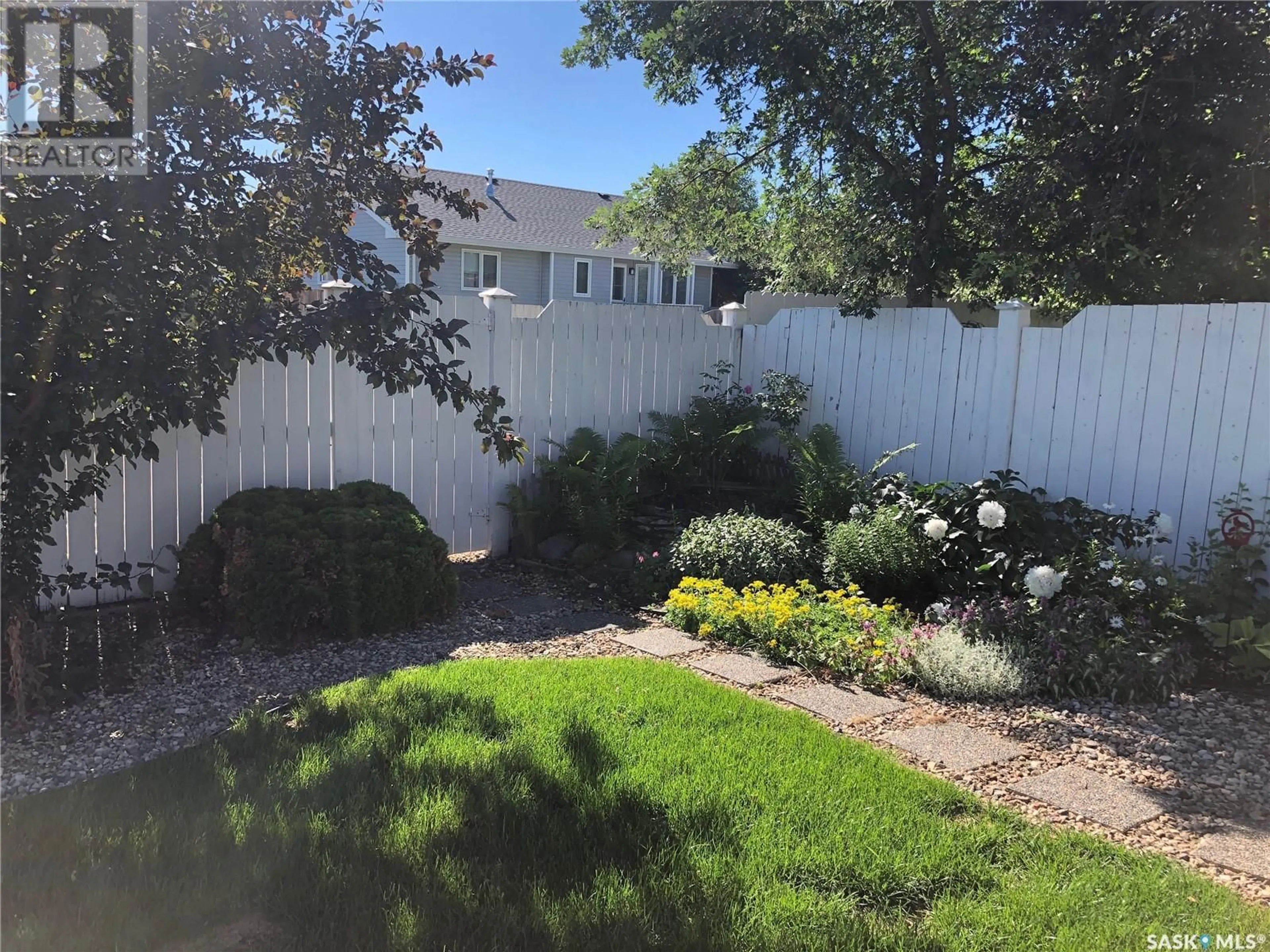 A pic from outside/outdoor area/front of a property/back of a property/a pic from drone, water/lake/river/ocean view for 1312 HEIDGERKEN CRESCENT, Humboldt Saskatchewan S0K2A0