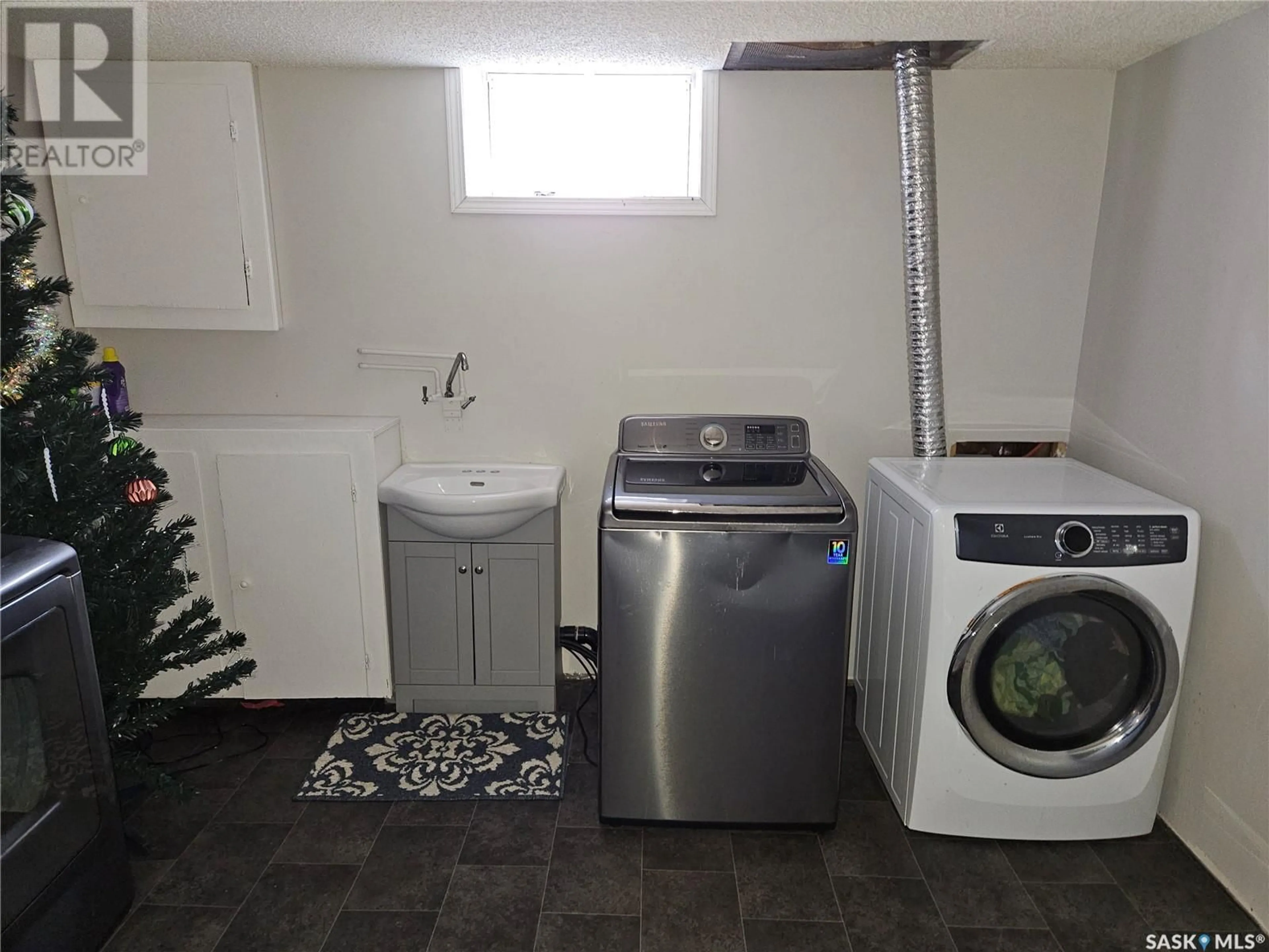Laundry room for 205 3RD STREET, Carlyle Saskatchewan S0C0R0