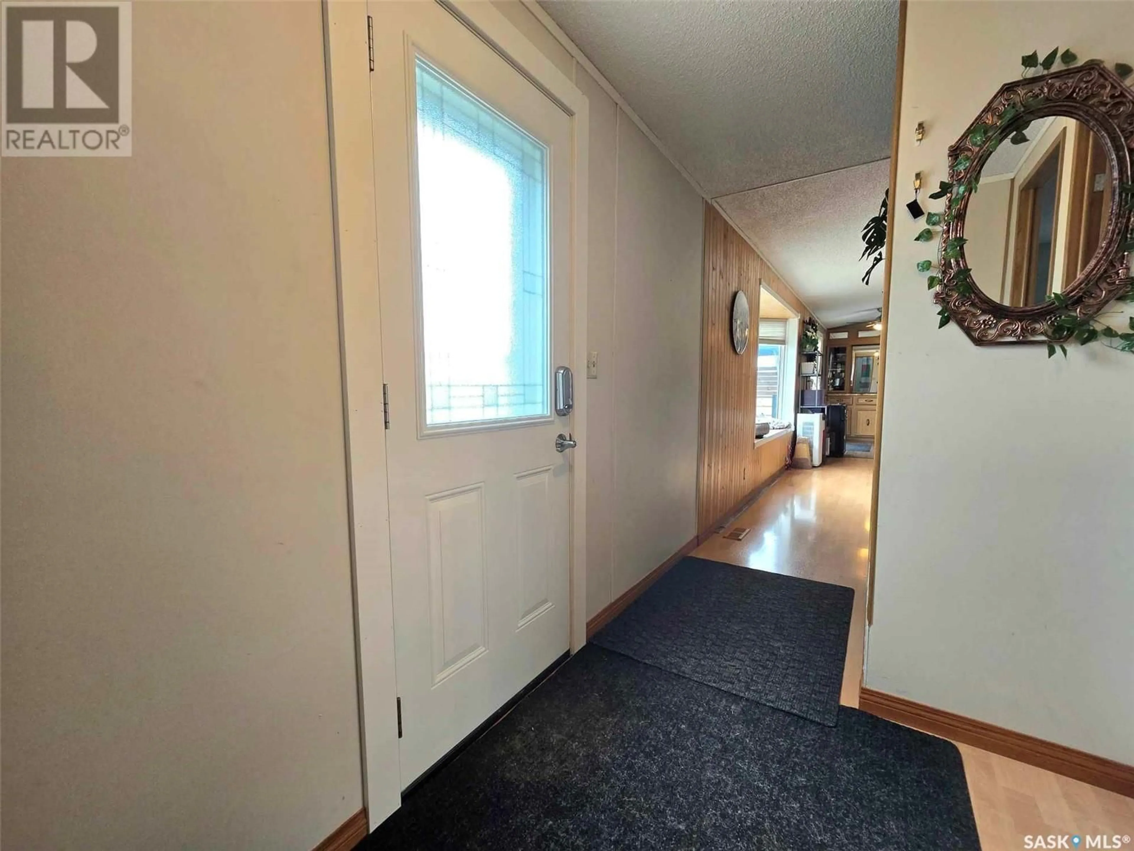 Indoor foyer for 117 MONTREAL STREET, Melville Saskatchewan S0A2P0