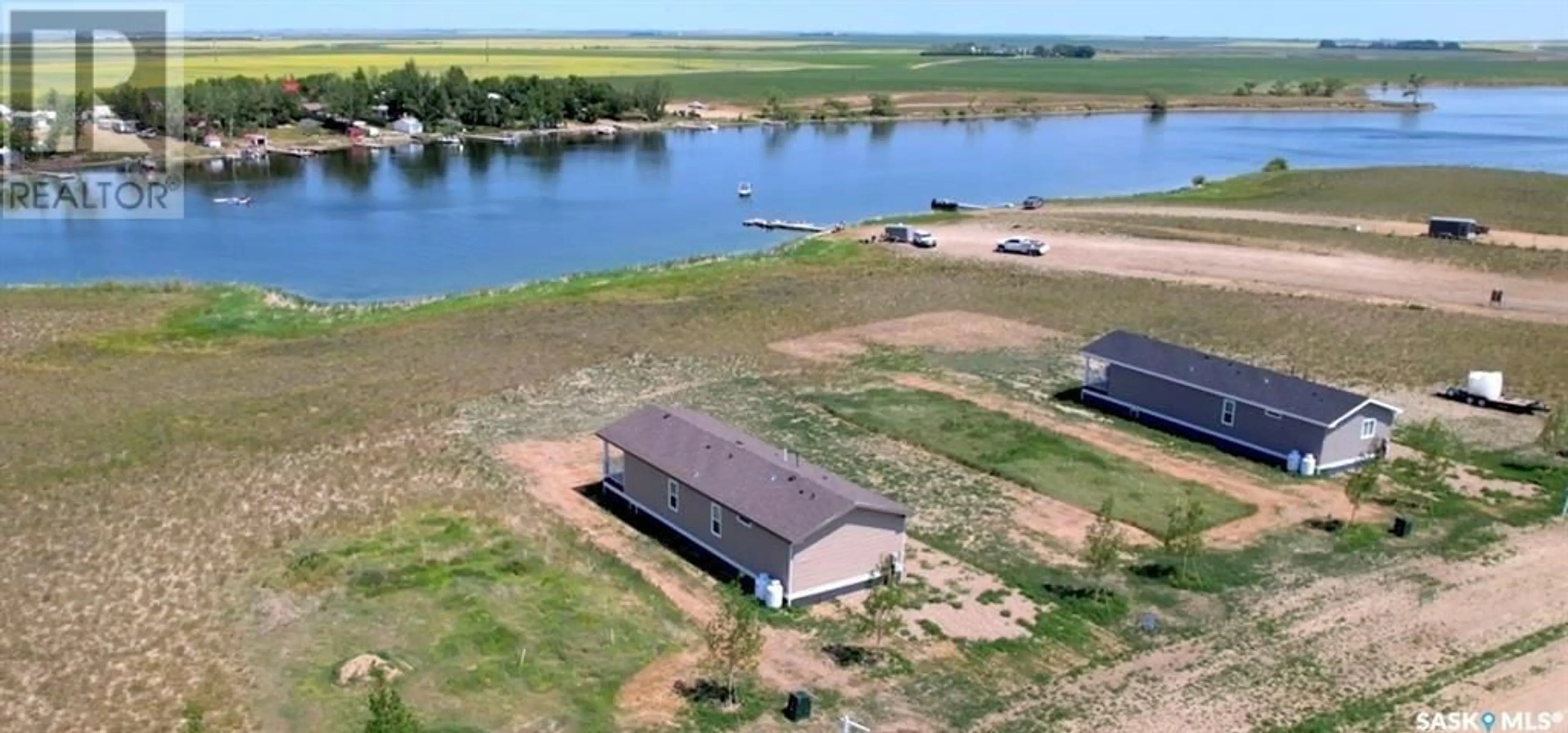 A pic from outside/outdoor area/front of a property/back of a property/a pic from drone, water/lake/river/ocean view for 9 LAKESHORE DRIVE, Gravelbourg Rm No. 104 Saskatchewan S0H1X0