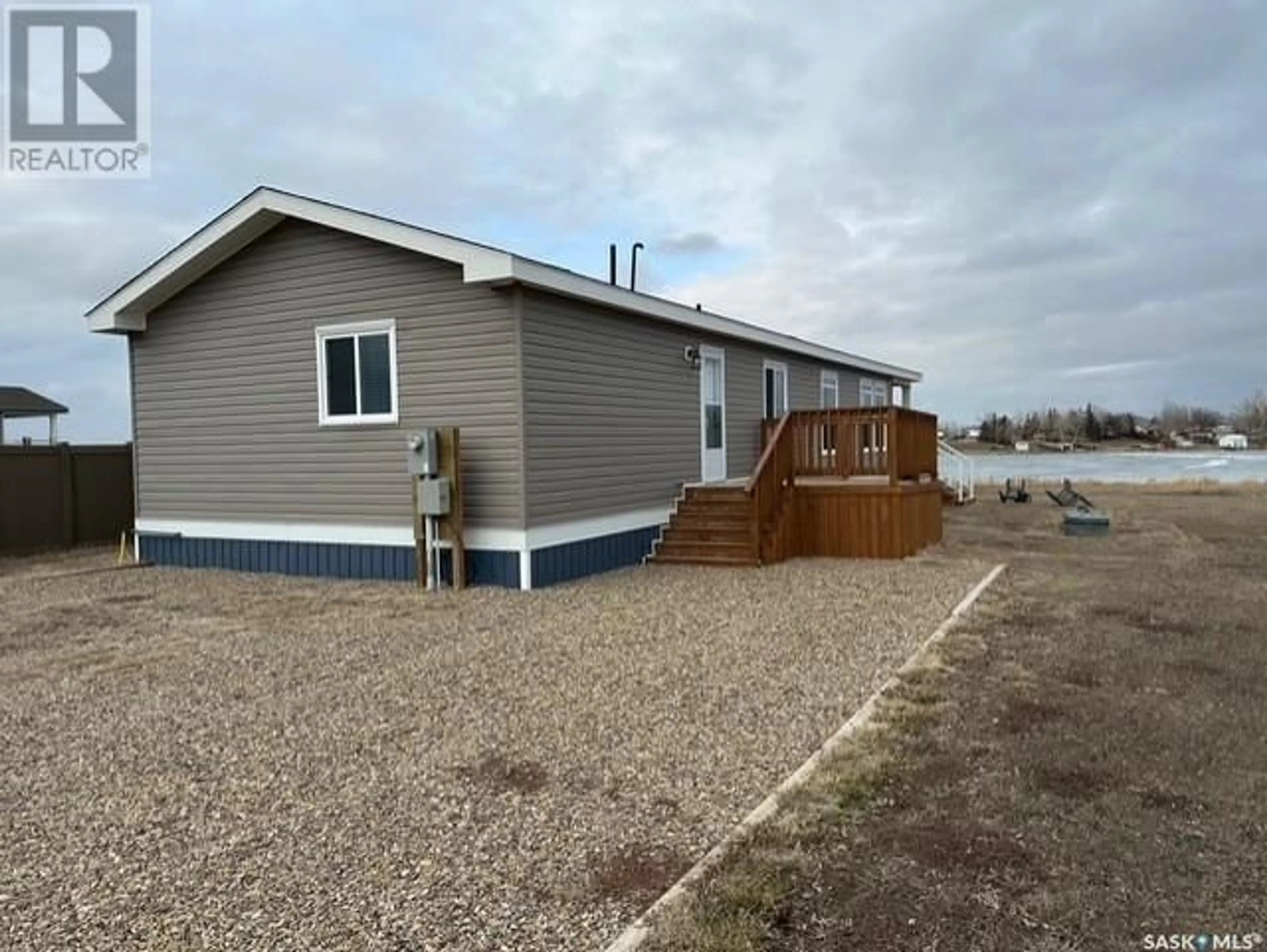 Home with vinyl exterior material, unknown for 11 LAKESHORE DRIVE, Gravelbourg Rm No. 104 Saskatchewan S0H1X0