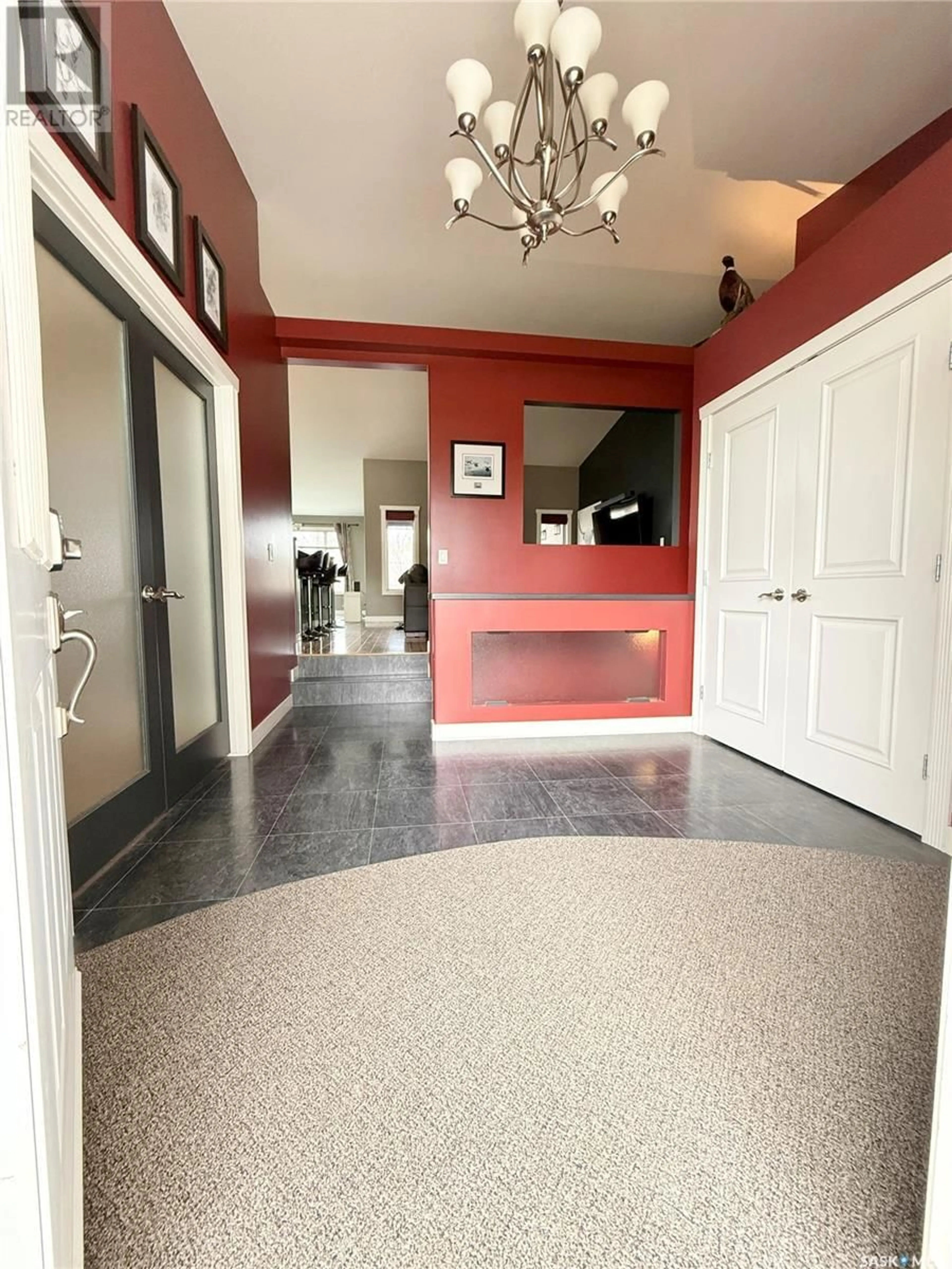 Indoor foyer for 715 18TH STREET, Weyburn Saskatchewan S4H3M2