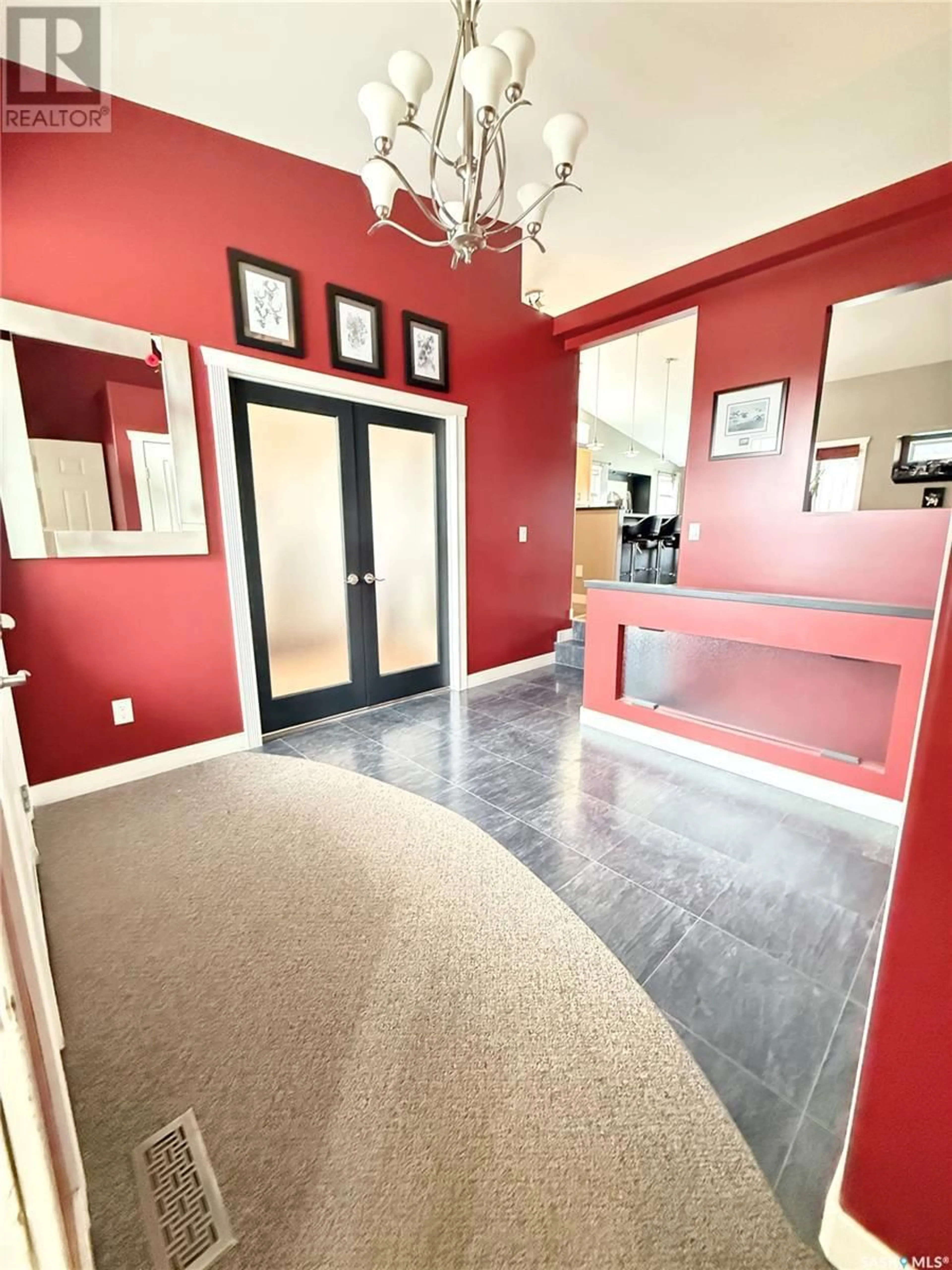 Indoor foyer for 715 18TH STREET, Weyburn Saskatchewan S4H3M2