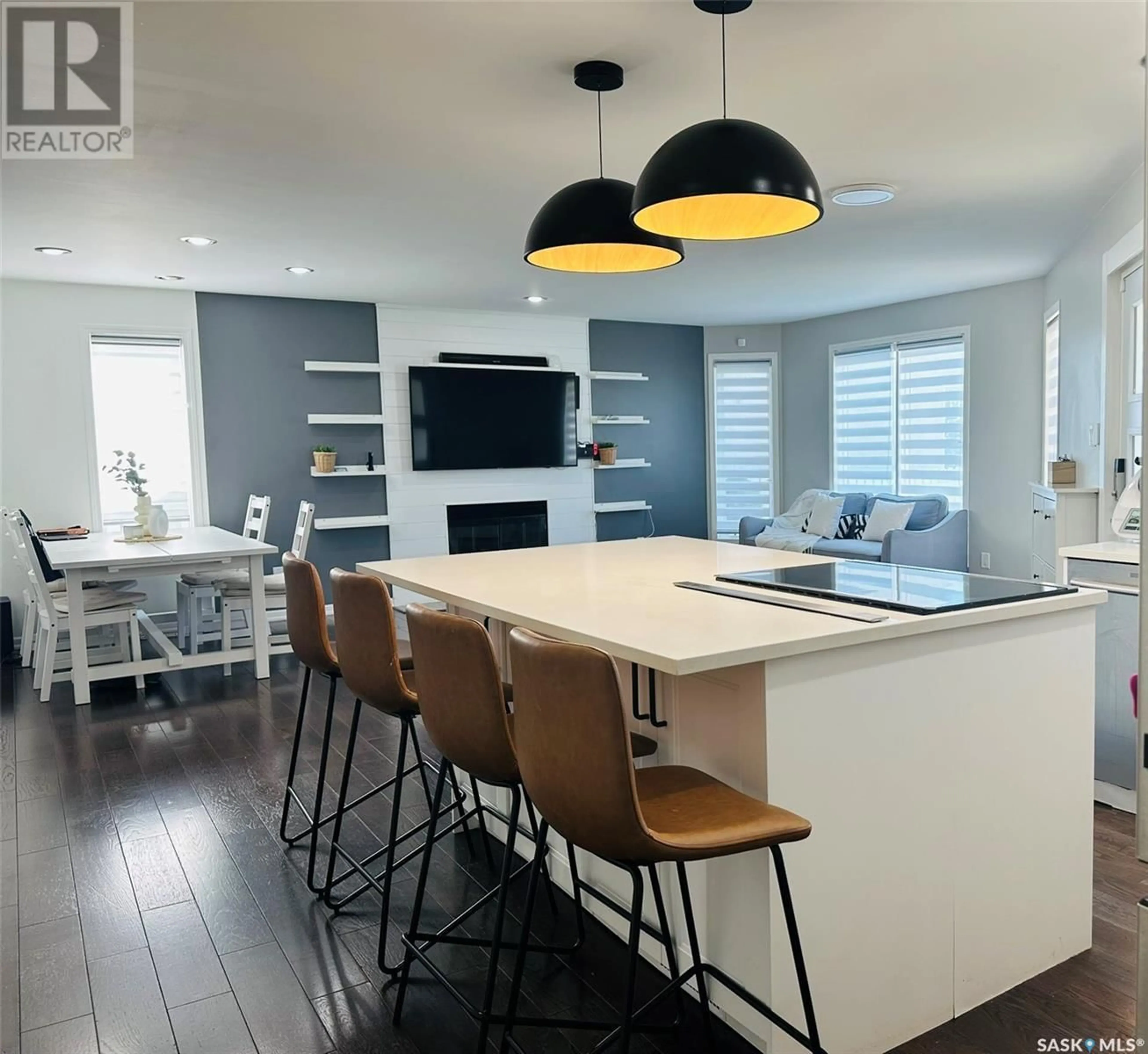 Open concept kitchen, wood/laminate floor for 1484 MATHER CRESCENT, Estevan Saskatchewan S4A2J8