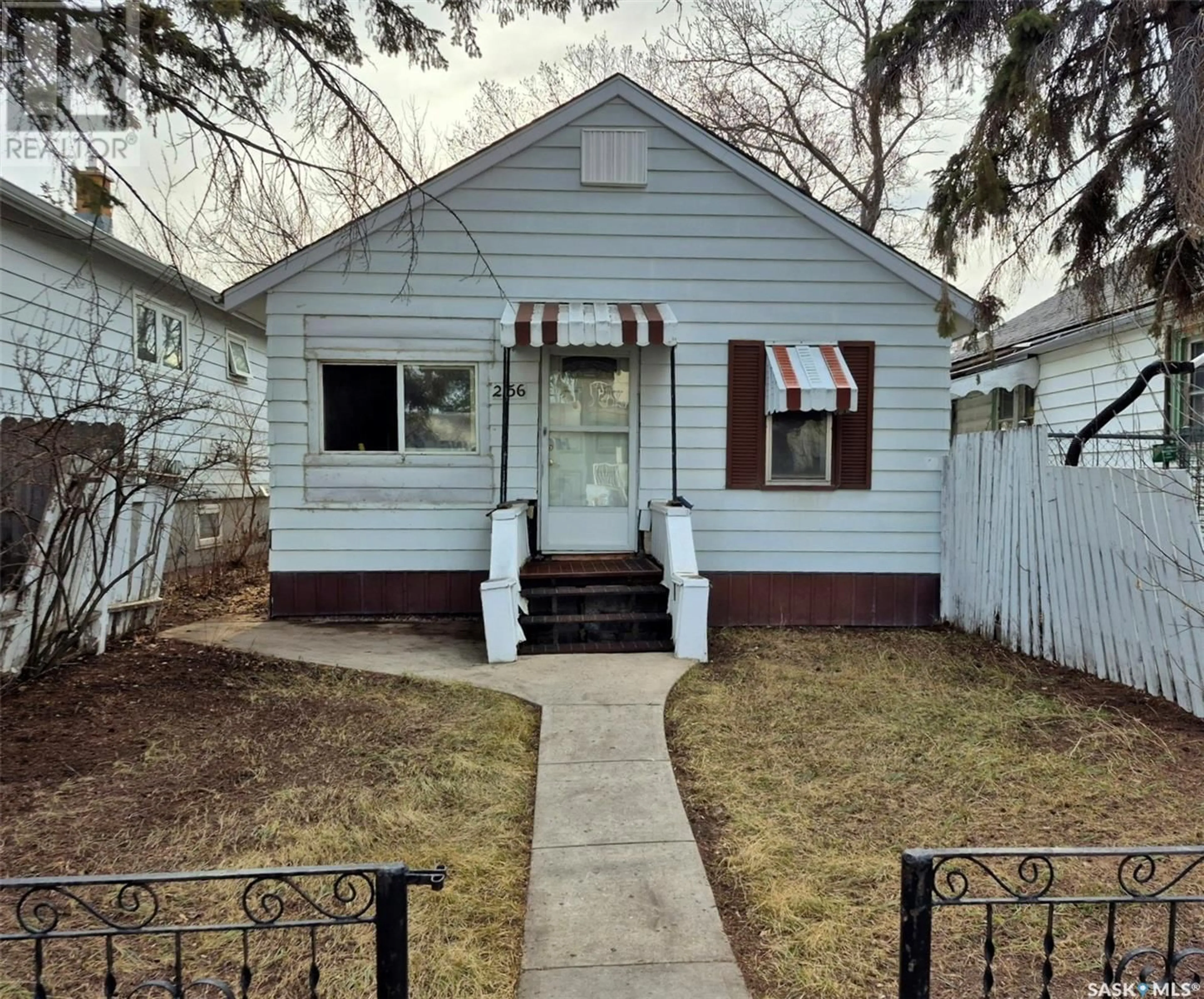Home with vinyl exterior material, street for 2156 LINDSAY STREET, Regina Saskatchewan S4N3B9