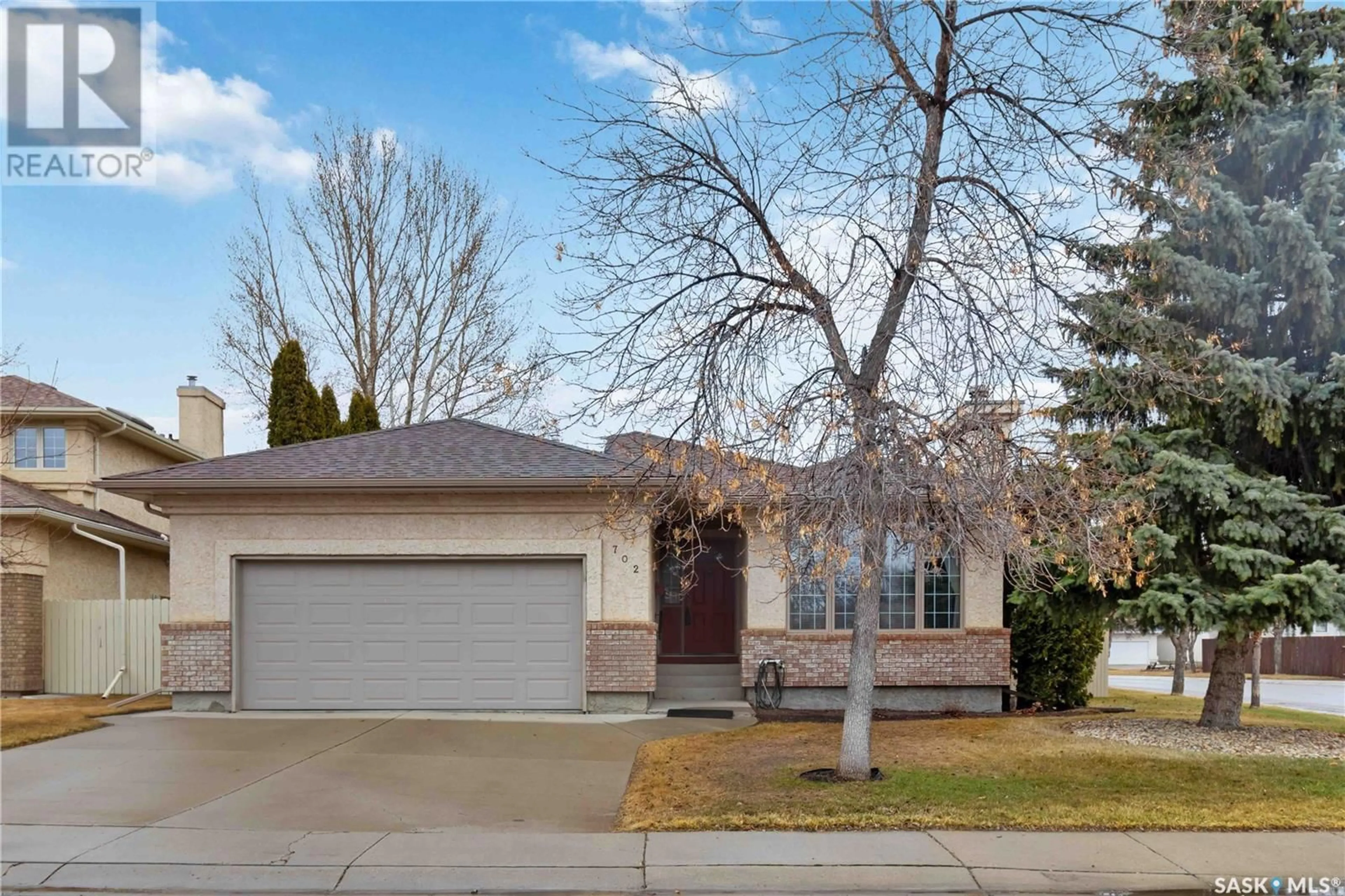 Home with brick exterior material, street for 702 STEIGER PLACE, Saskatoon Saskatchewan S7N4K3