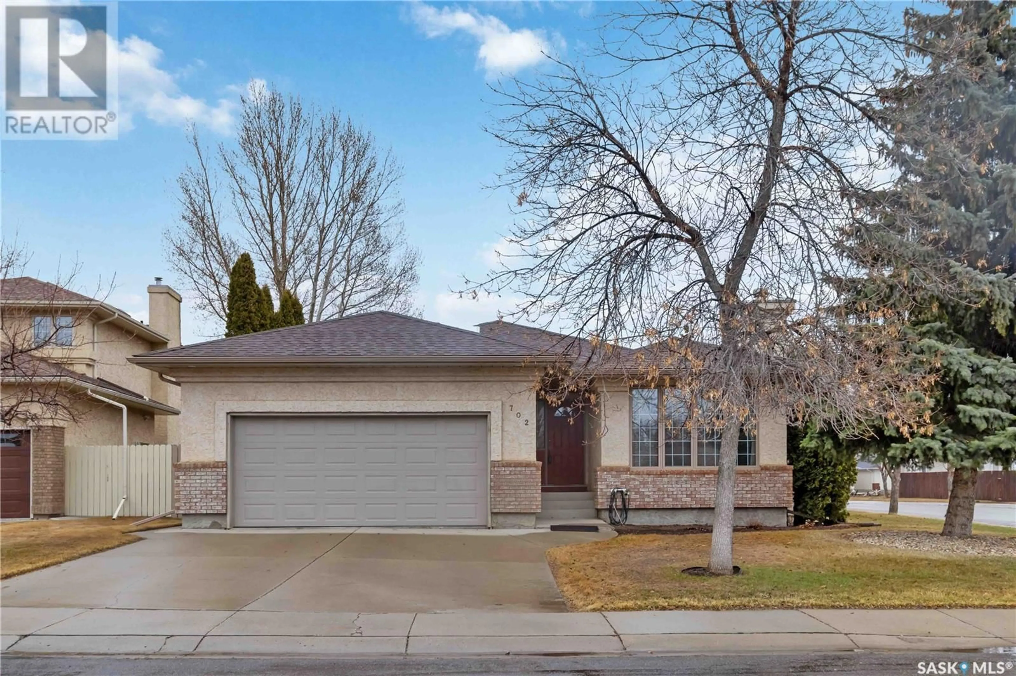 Home with brick exterior material, street for 702 STEIGER PLACE, Saskatoon Saskatchewan S7N4K3
