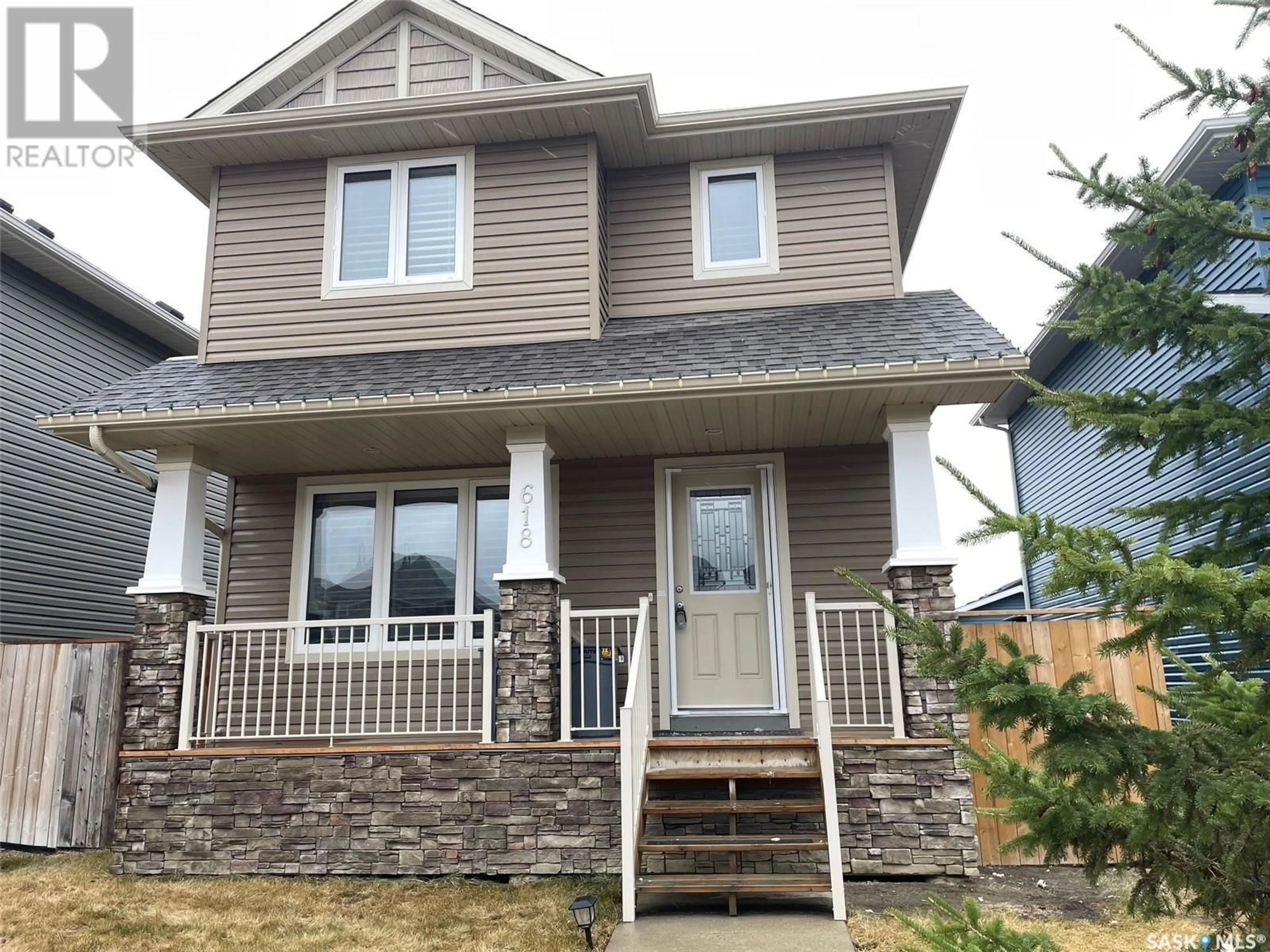 Home with vinyl exterior material, street for 618 KOLYNCHUK COURT, Saskatoon Saskatchewan S7T0W1