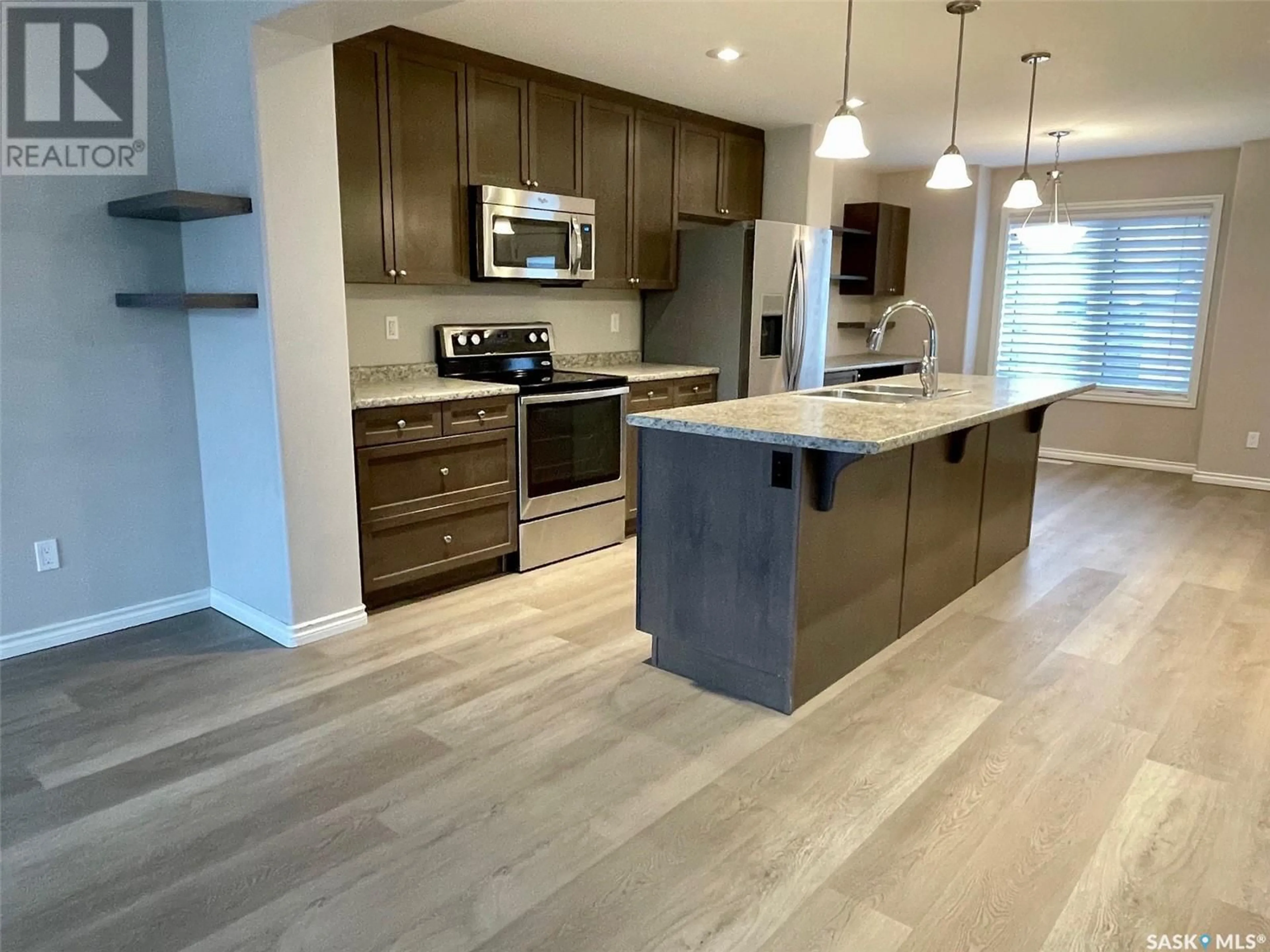 Open concept kitchen, unknown for 618 KOLYNCHUK COURT, Saskatoon Saskatchewan S7T0W1