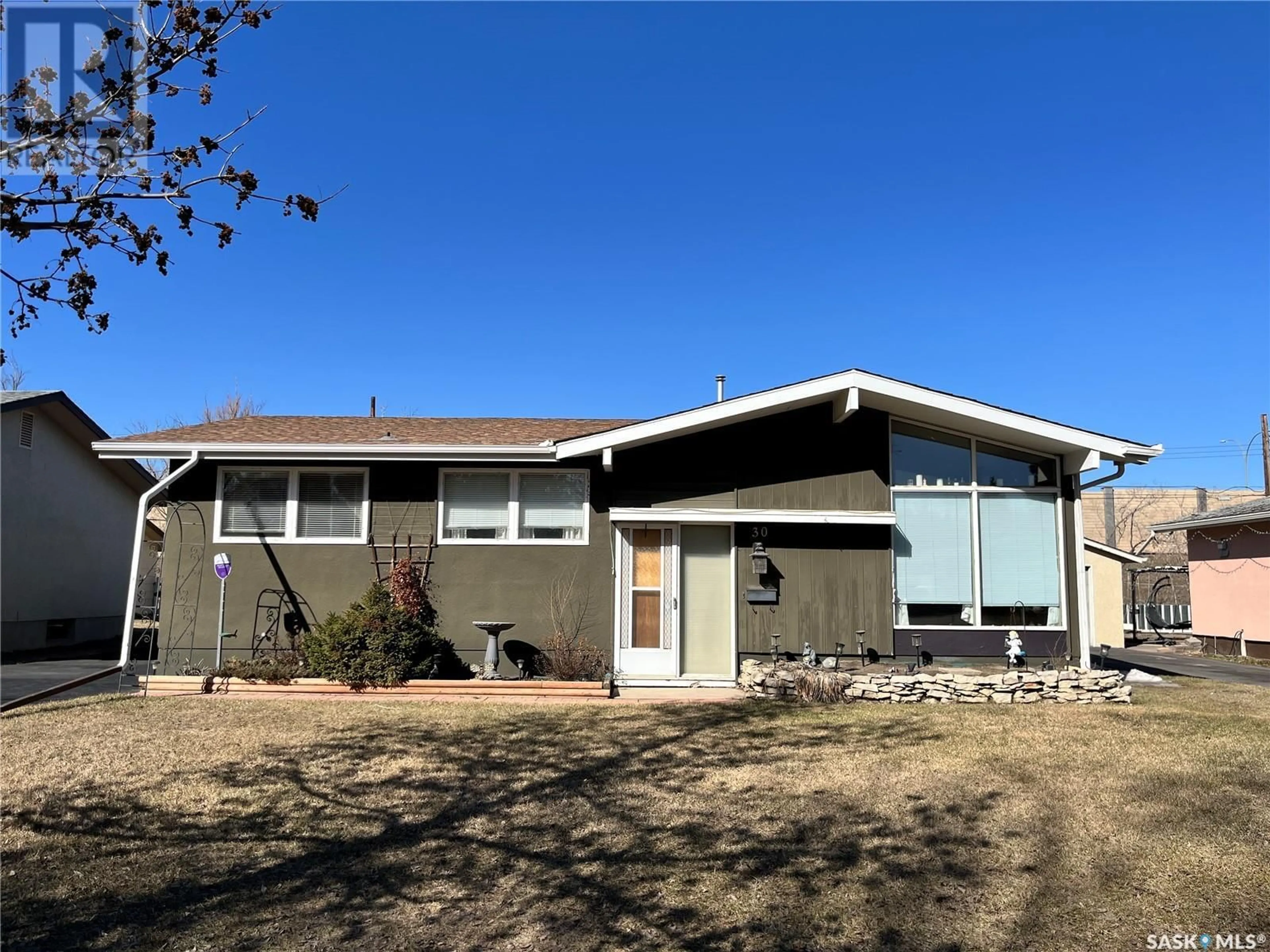 Home with vinyl exterior material, street for 30 SPINKS DRIVE, Saskatoon Saskatchewan S7H3W8