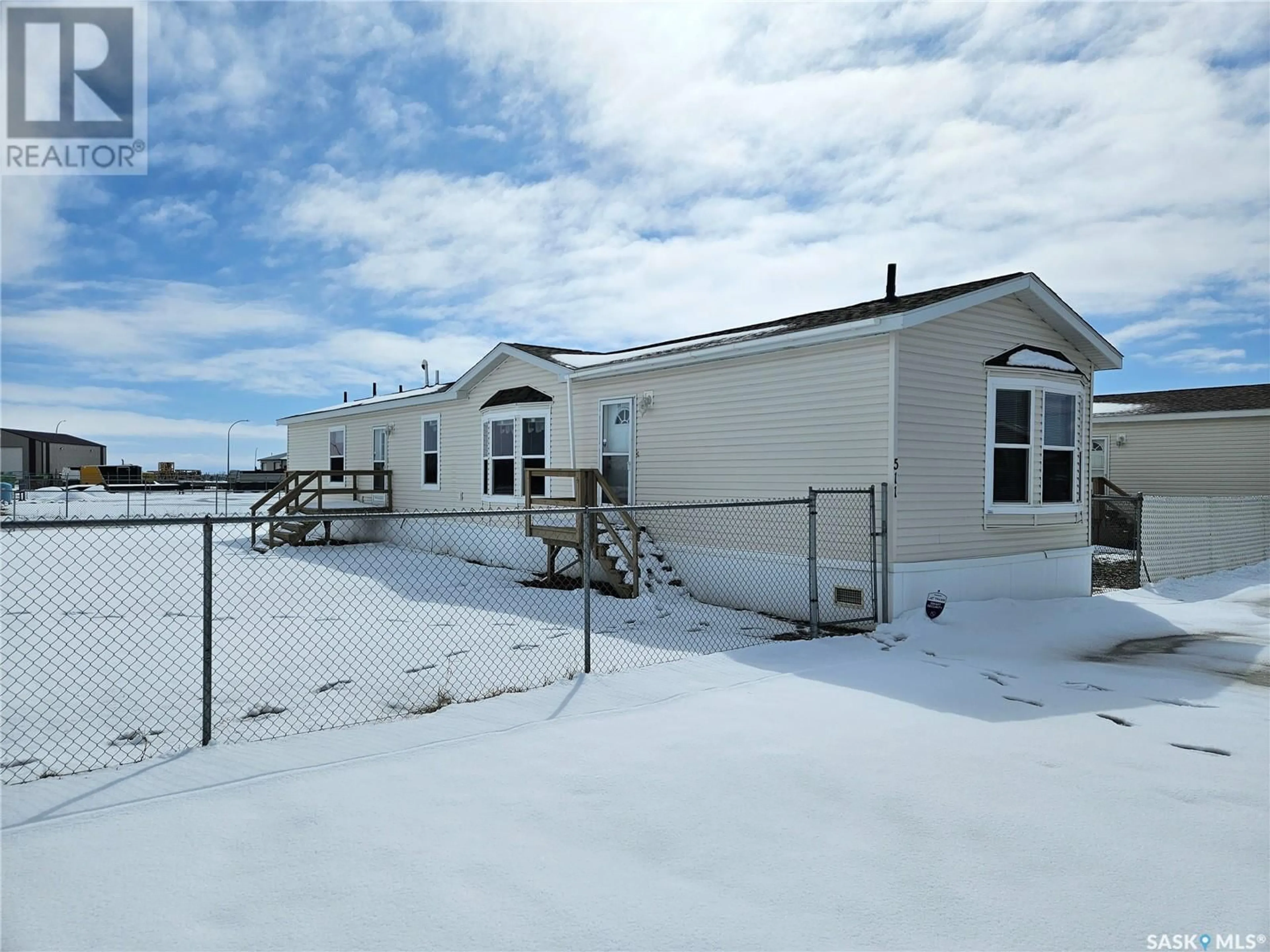 A pic from outside/outdoor area/front of a property/back of a property/a pic from drone, unknown for 511 STOCKTON AVENUE, Carlyle Saskatchewan S0C0R0