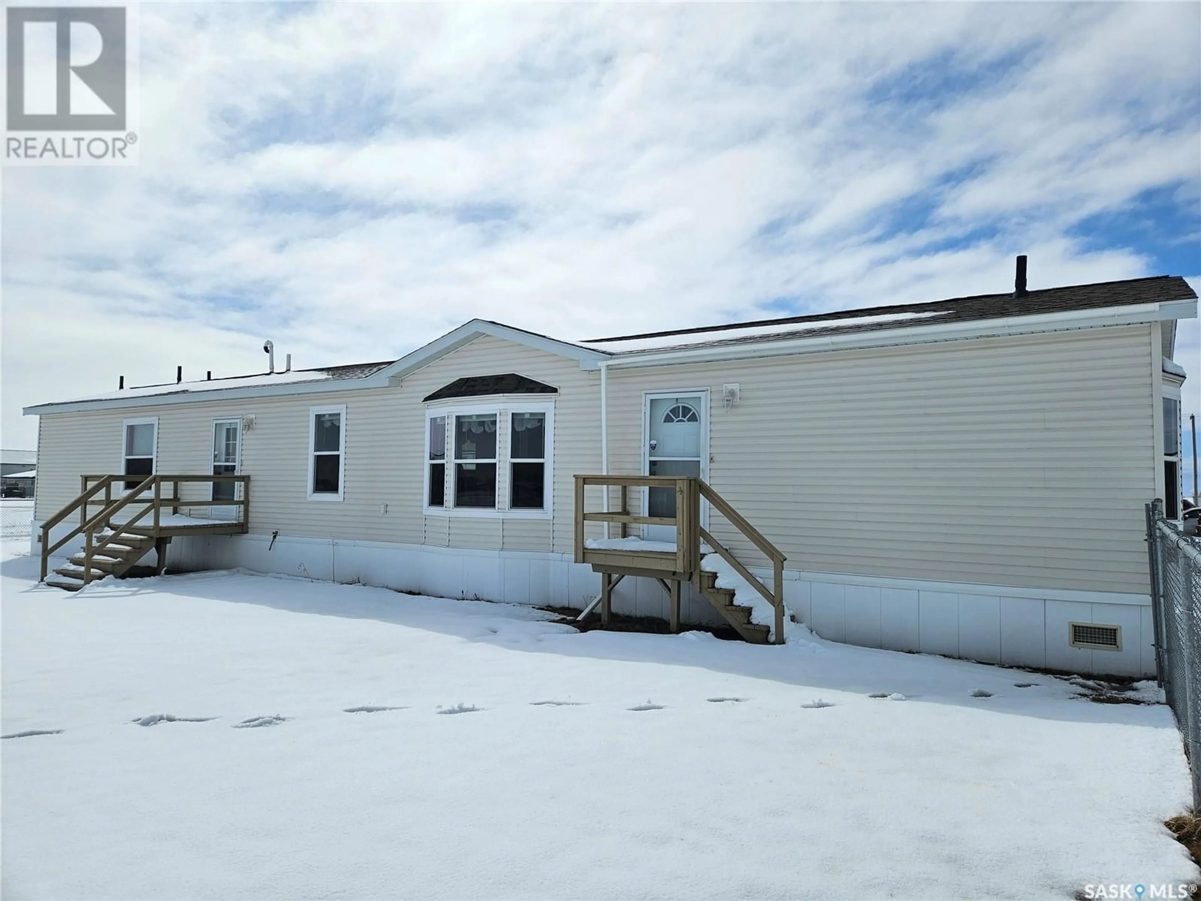 Home with vinyl exterior material, unknown for 511 STOCKTON AVENUE, Carlyle Saskatchewan S0C0R0