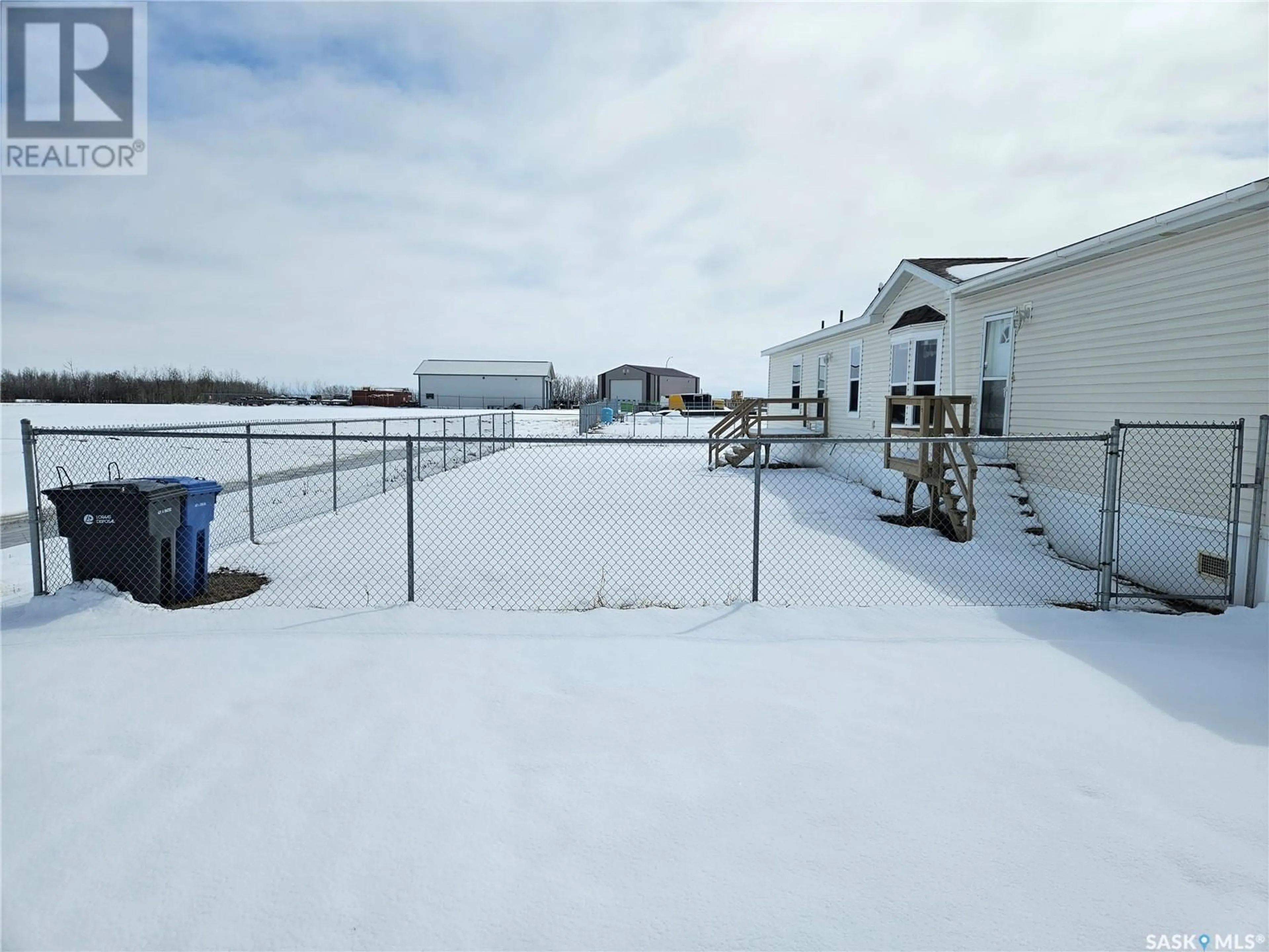 A pic from outside/outdoor area/front of a property/back of a property/a pic from drone, water/lake/river/ocean view for 511 STOCKTON AVENUE, Carlyle Saskatchewan S0C0R0