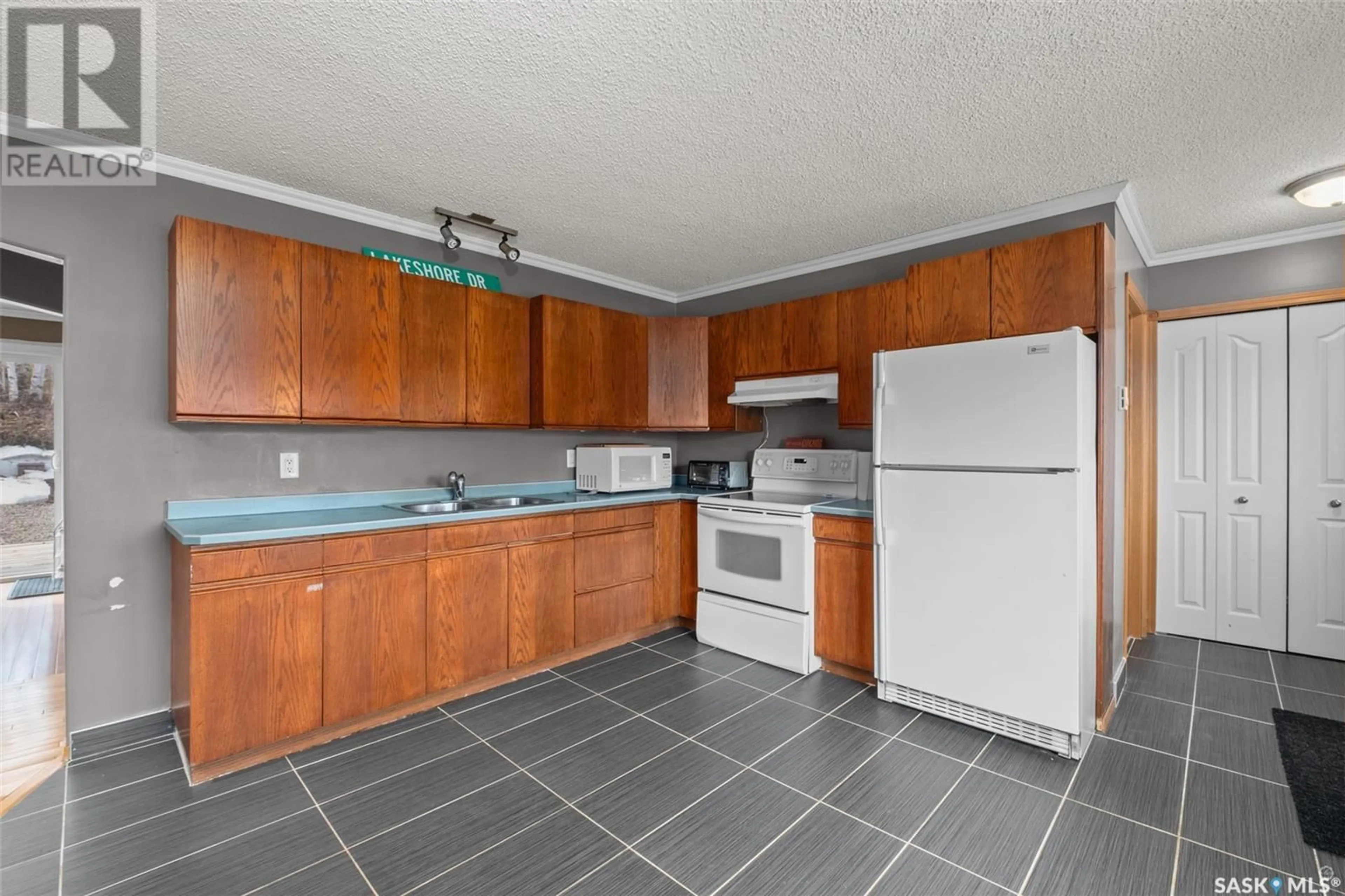 Standard kitchen, ceramic/tile floor for 277 CARWIN PARK DRIVE, Emma Lake Saskatchewan S0J0N0