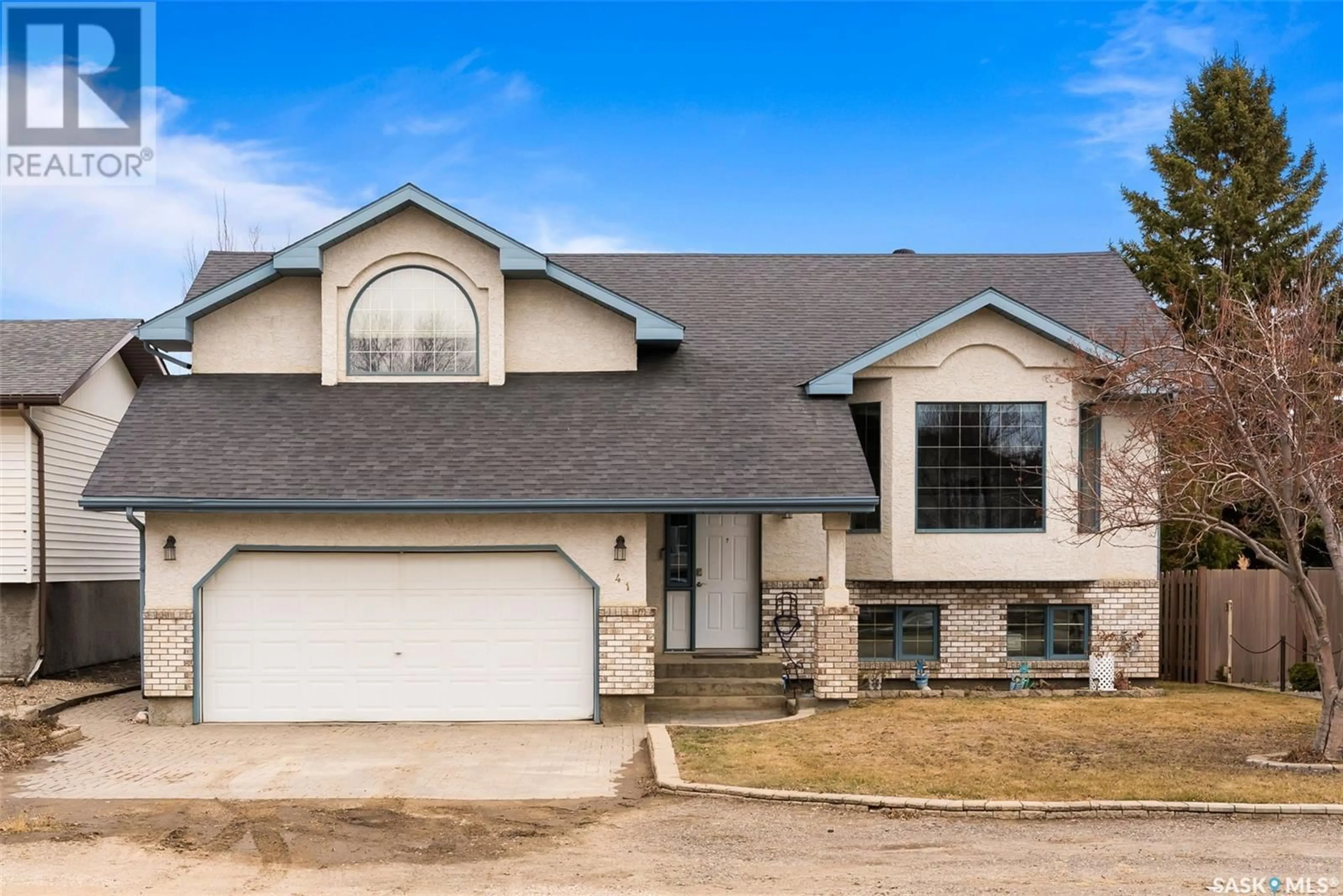 Home with vinyl exterior material, street for 41 HAUGEN BAY, Mclean Saskatchewan S0G3E0