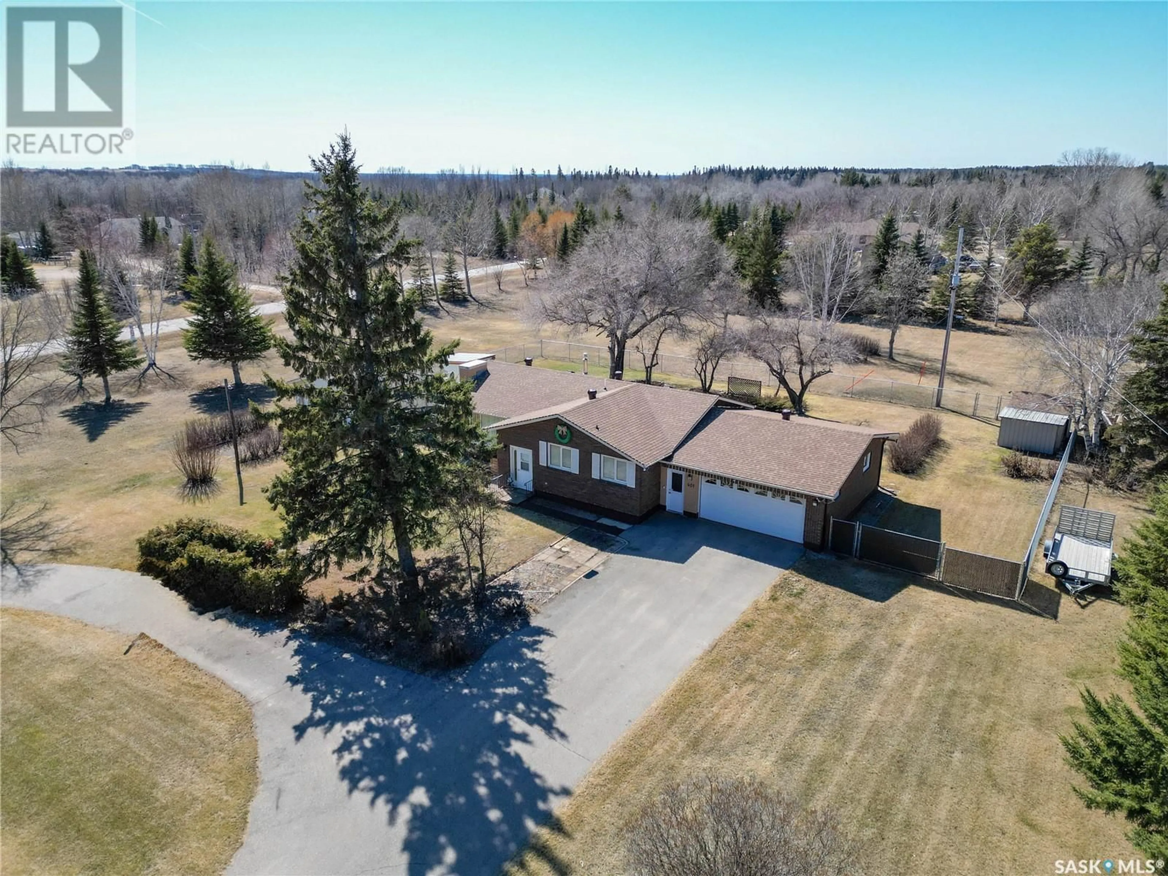 A pic from outside/outdoor area/front of a property/back of a property/a pic from drone, unknown for 401 CEDAR AVENUE, Buckland Rm No. 491 Saskatchewan S6V5R3