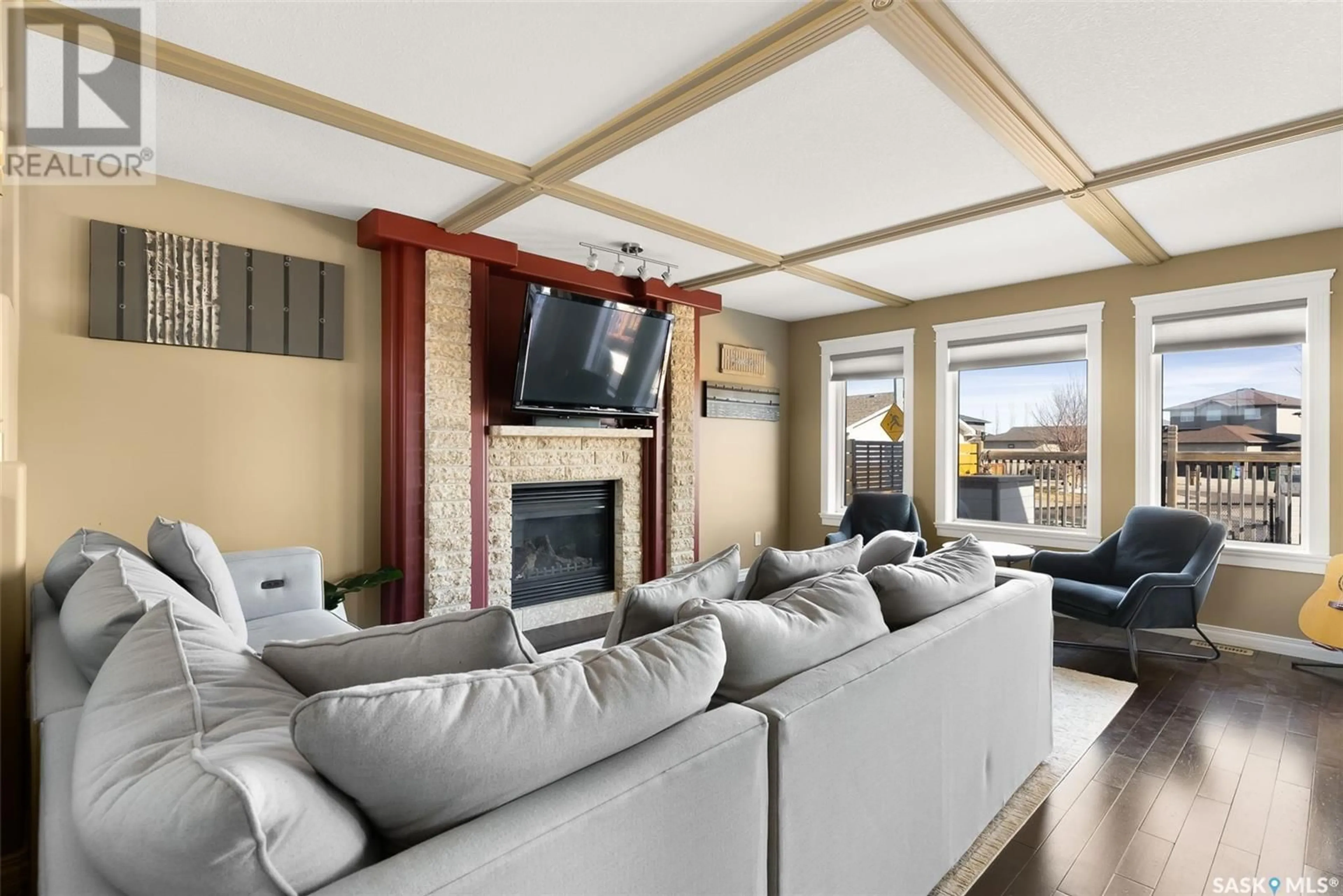Living room with furniture, unknown for 7155 MAPLE COVE, Regina Saskatchewan S4X0E3