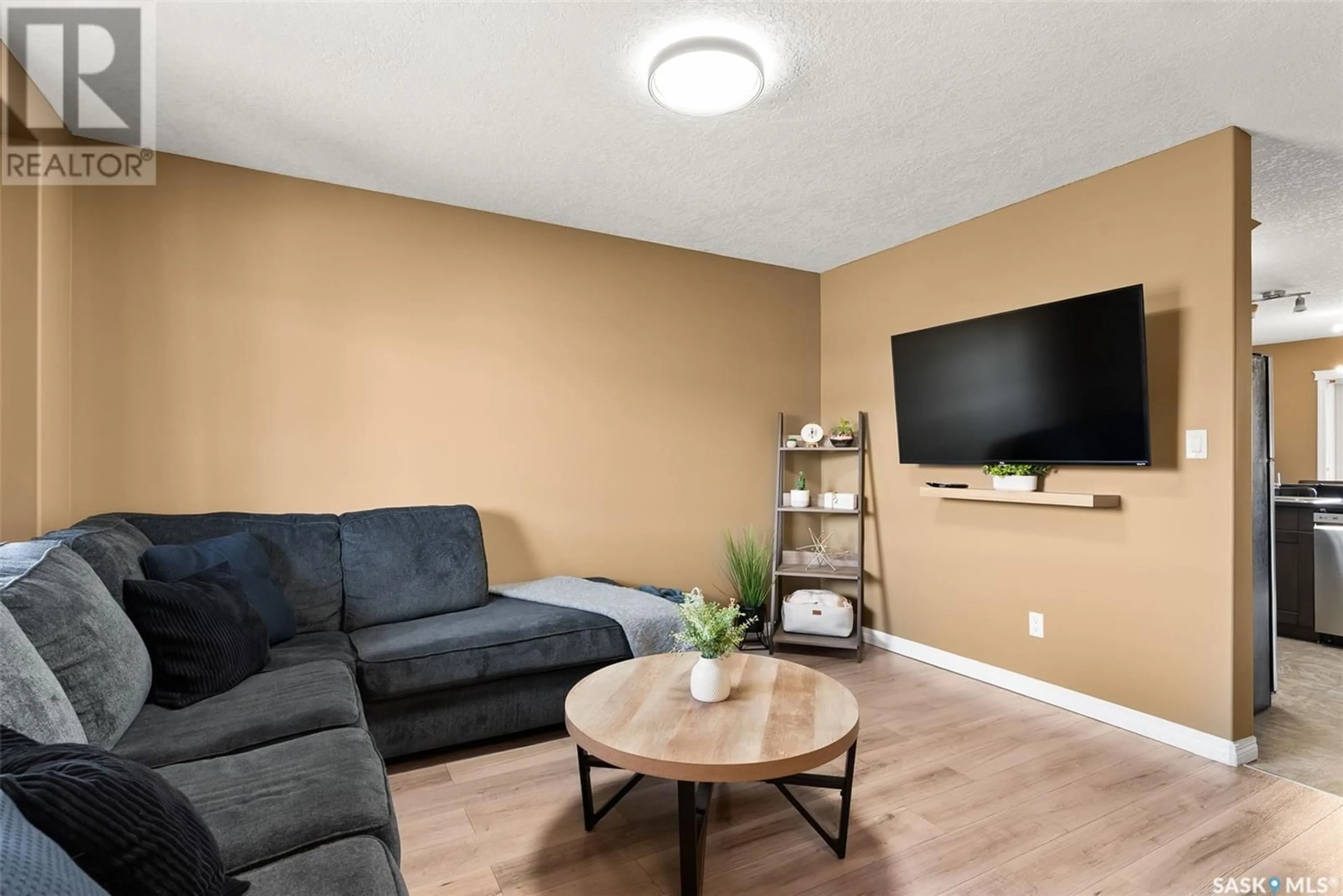 Living room with furniture, unknown for 3806 - 717 DEWDNEY AVENUE, Regina Saskatchewan S4Z0A6