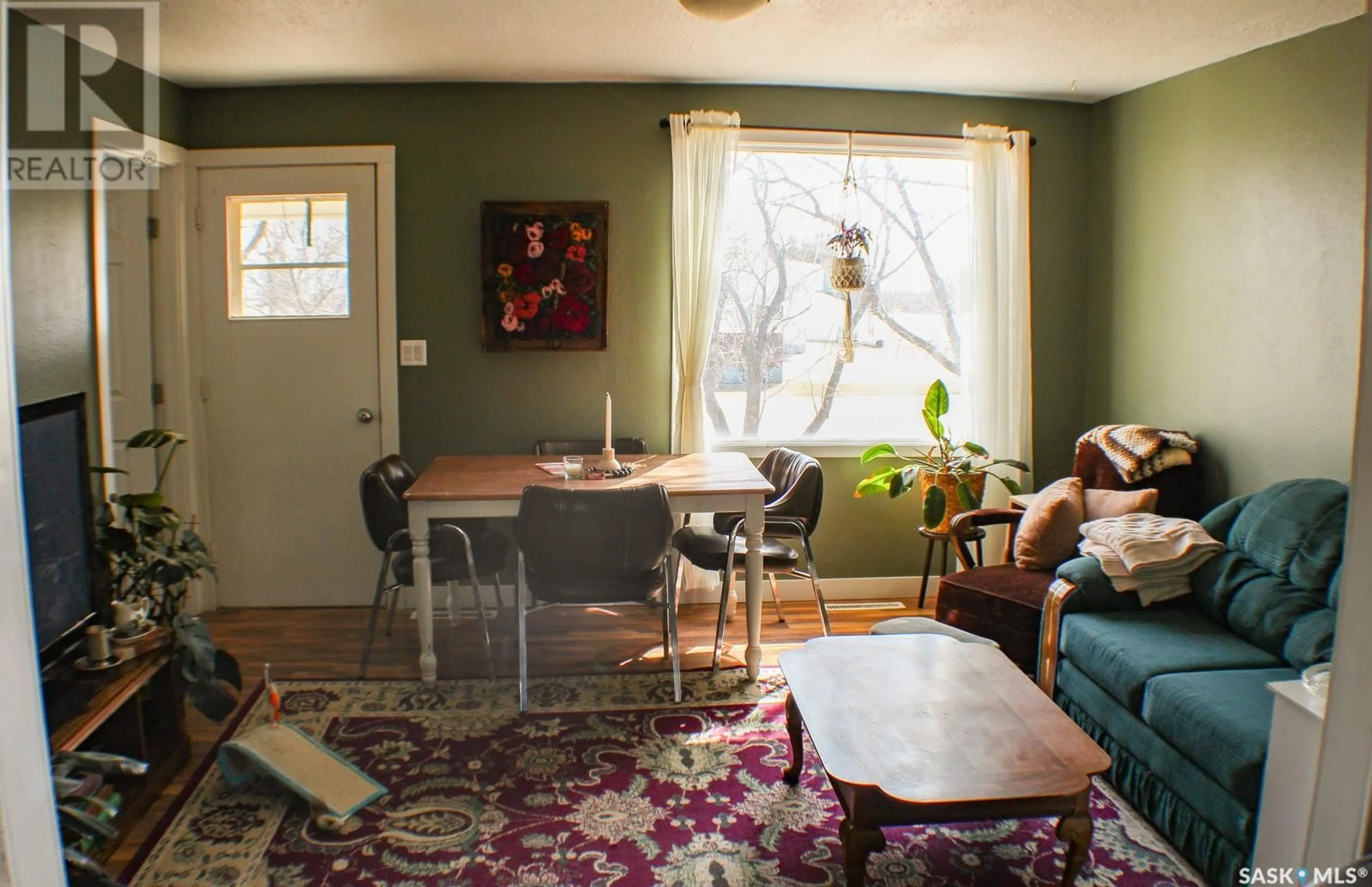 Living room with furniture, unknown for 235 1ST STREET, Beatty Saskatchewan S0J0C0
