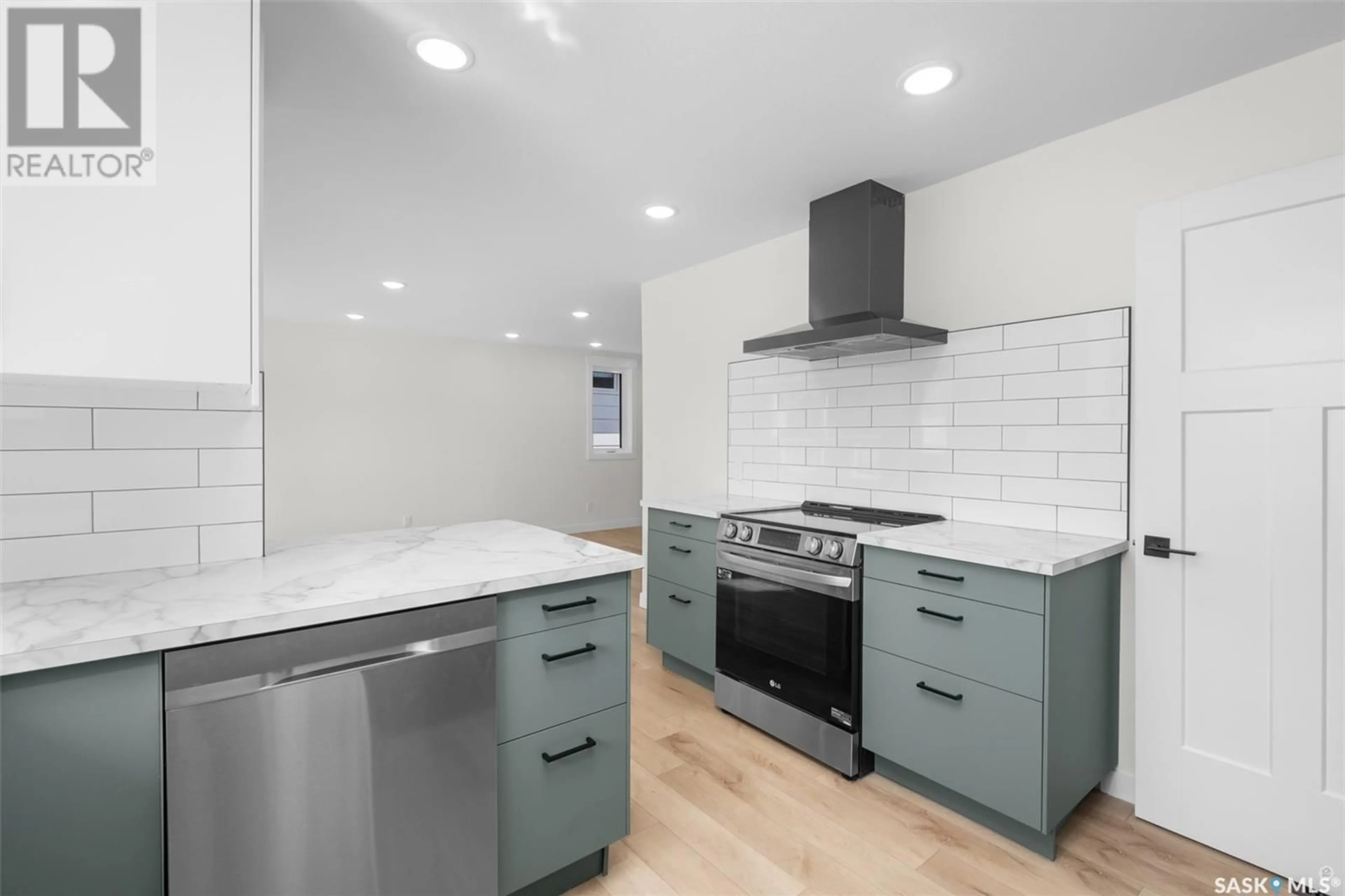 Open concept kitchen, ceramic/tile floor for 736 3RD STREET, Prince Albert Saskatchewan S6V0H8