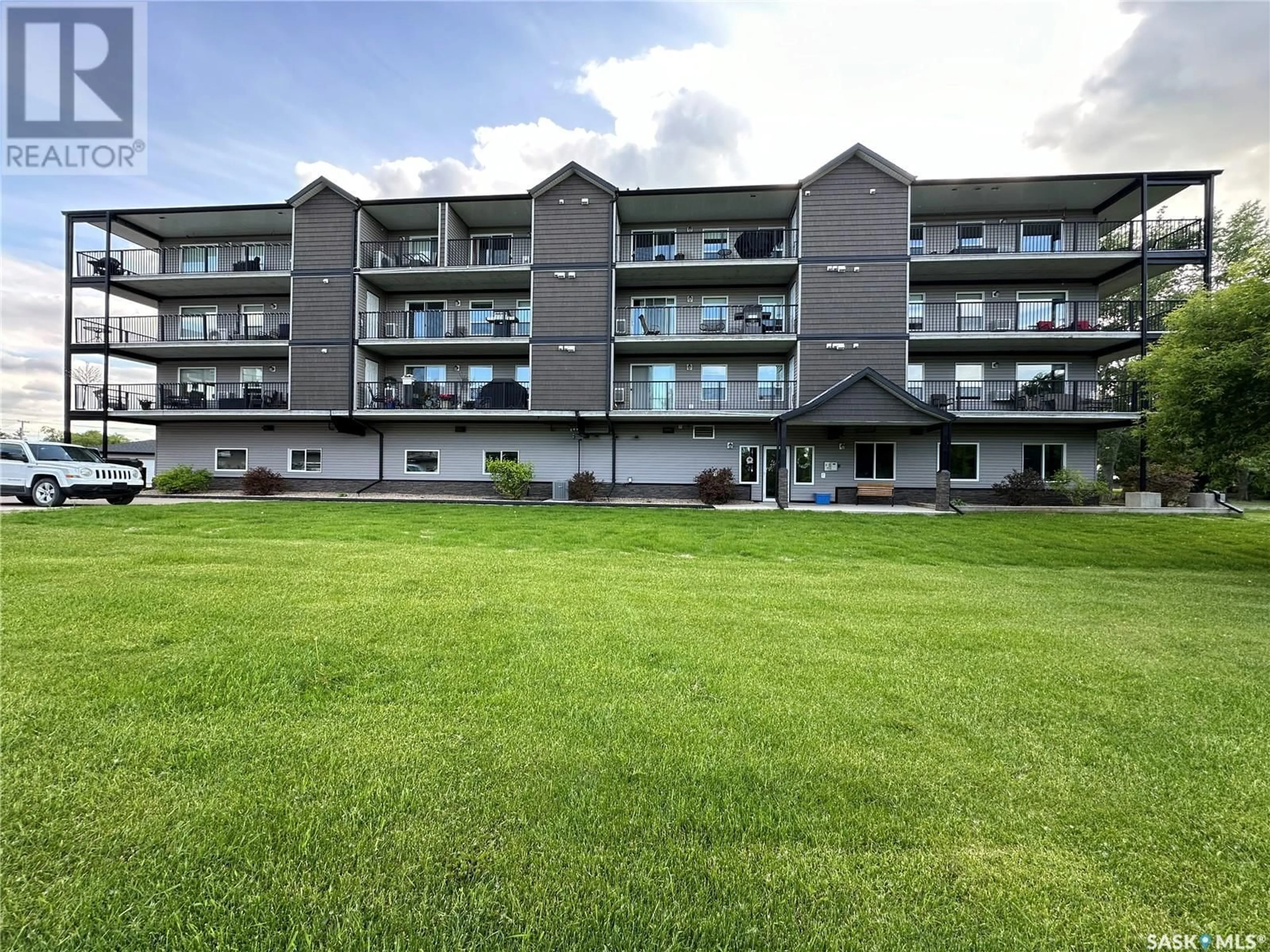 A pic from outside/outdoor area/front of a property/back of a property/a pic from drone, building for 206 1213 9TH STREET, Humboldt Saskatchewan S0K2A0