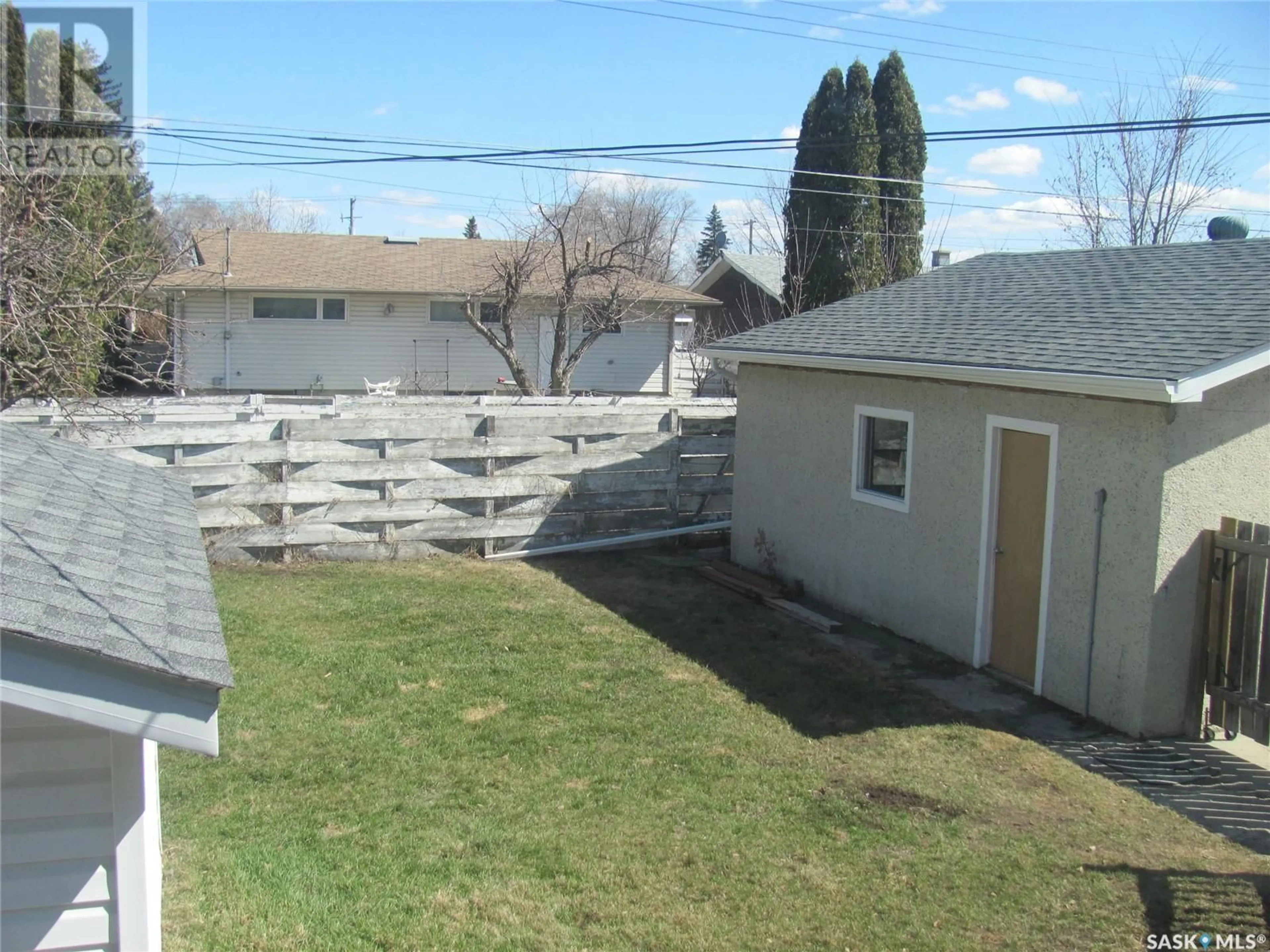 A pic from outside/outdoor area/front of a property/back of a property/a pic from drone, street for 126 O'NEIL CRESCENT, Saskatoon Saskatchewan S7N1W8