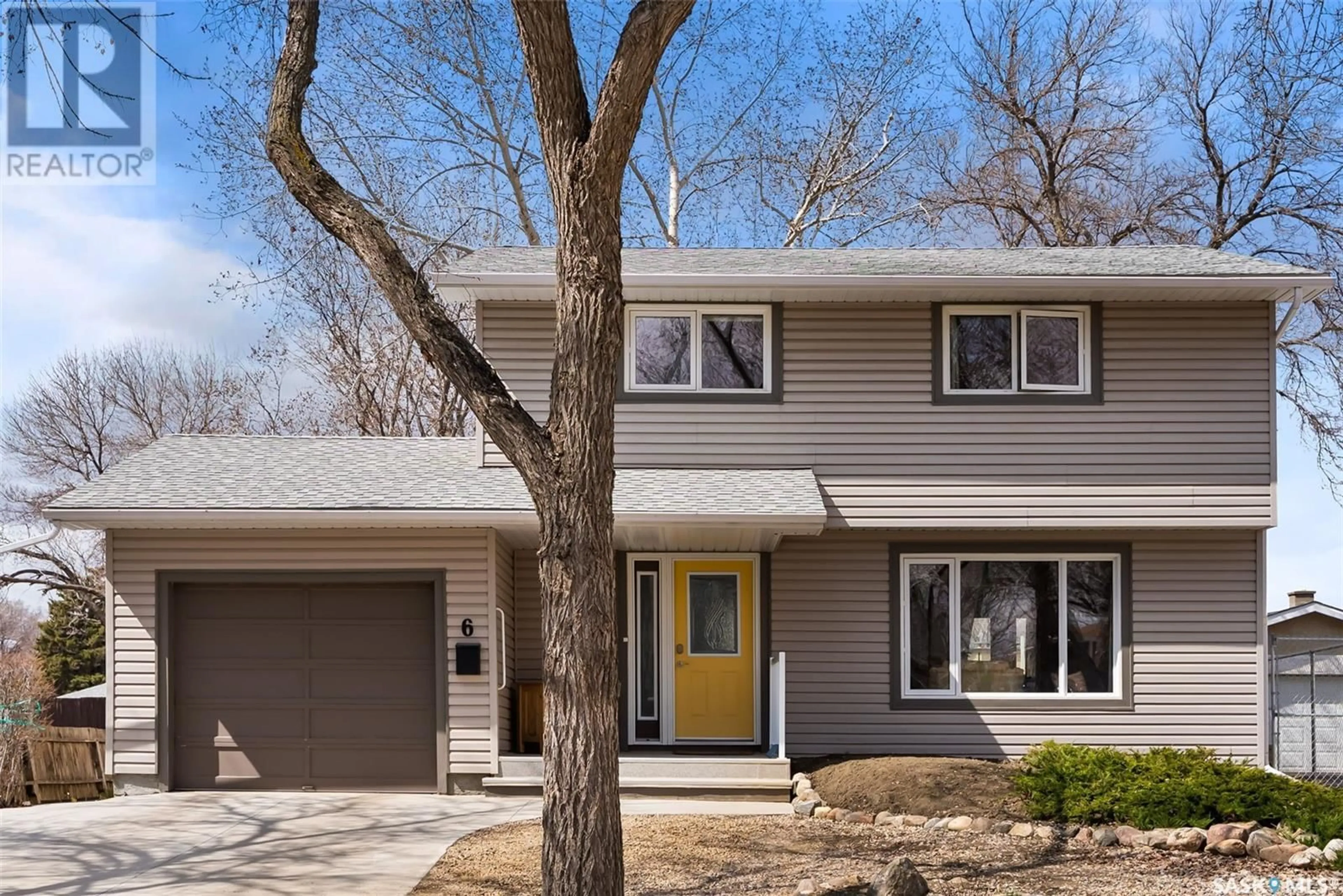Home with vinyl exterior material, street for 6 MCCAUL CRESCENT, Regina Saskatchewan S4R3X1