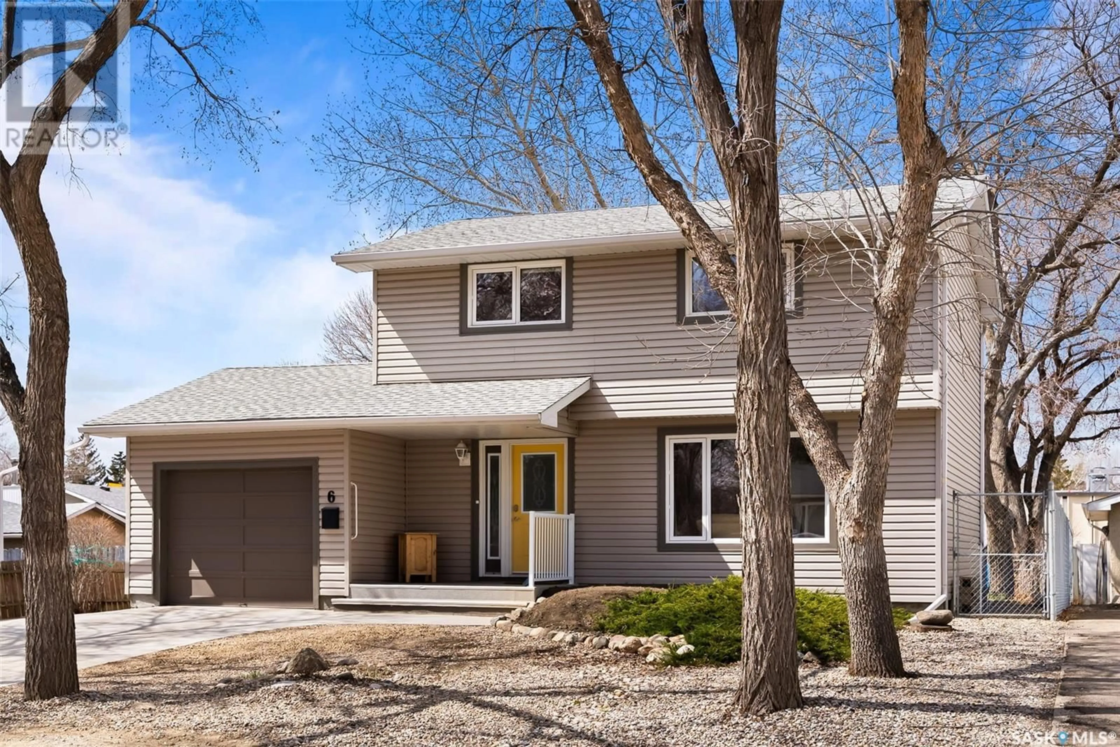 Home with vinyl exterior material, street for 6 MCCAUL CRESCENT, Regina Saskatchewan S4R3X1