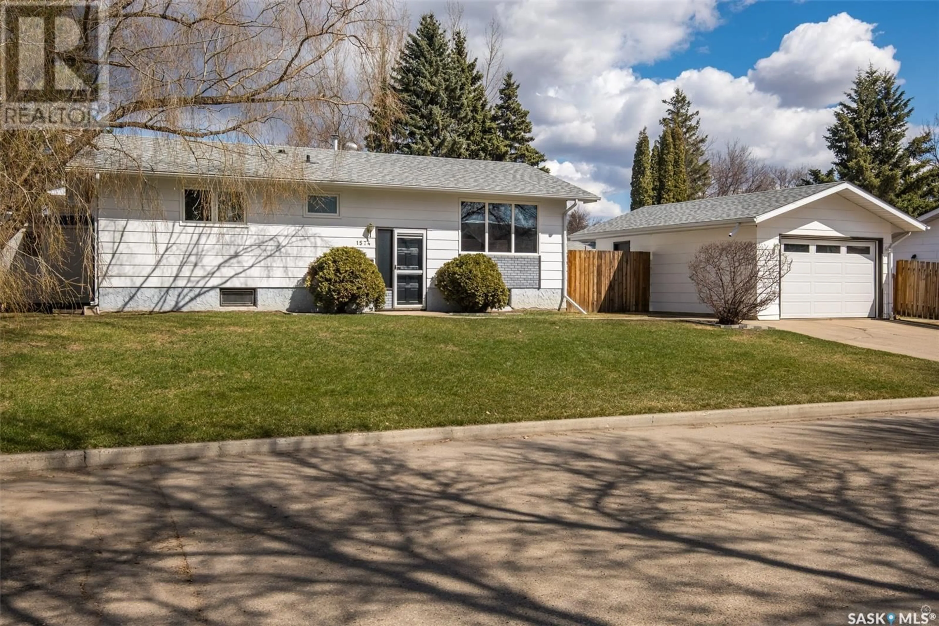 Home with vinyl exterior material, street for 1574 SIBBALD CRESCENT, Prince Albert Saskatchewan S6V6E7