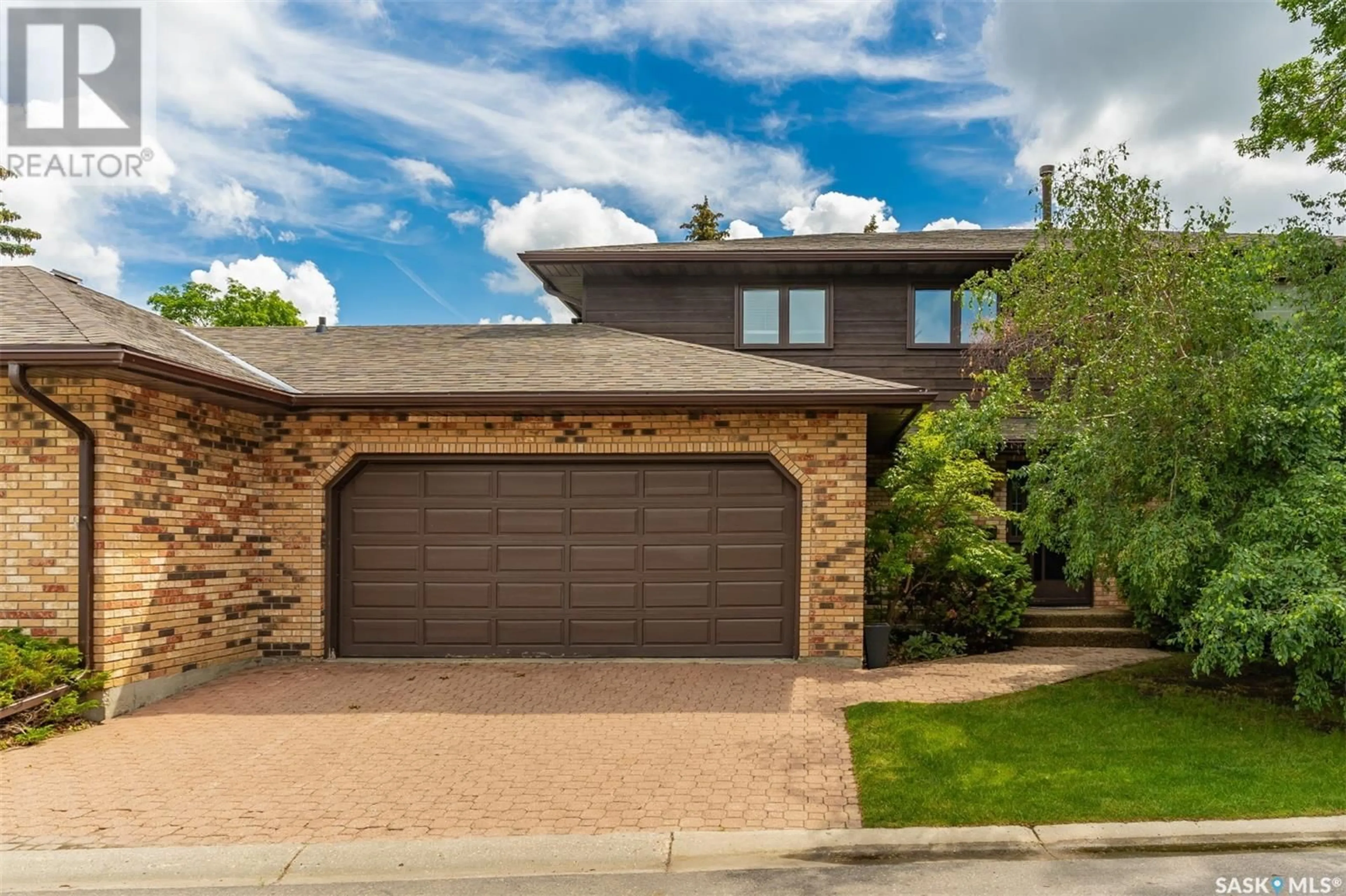 Home with brick exterior material, street for 203 415 HERITAGE CRESCENT, Saskatoon Saskatchewan S7H5M5