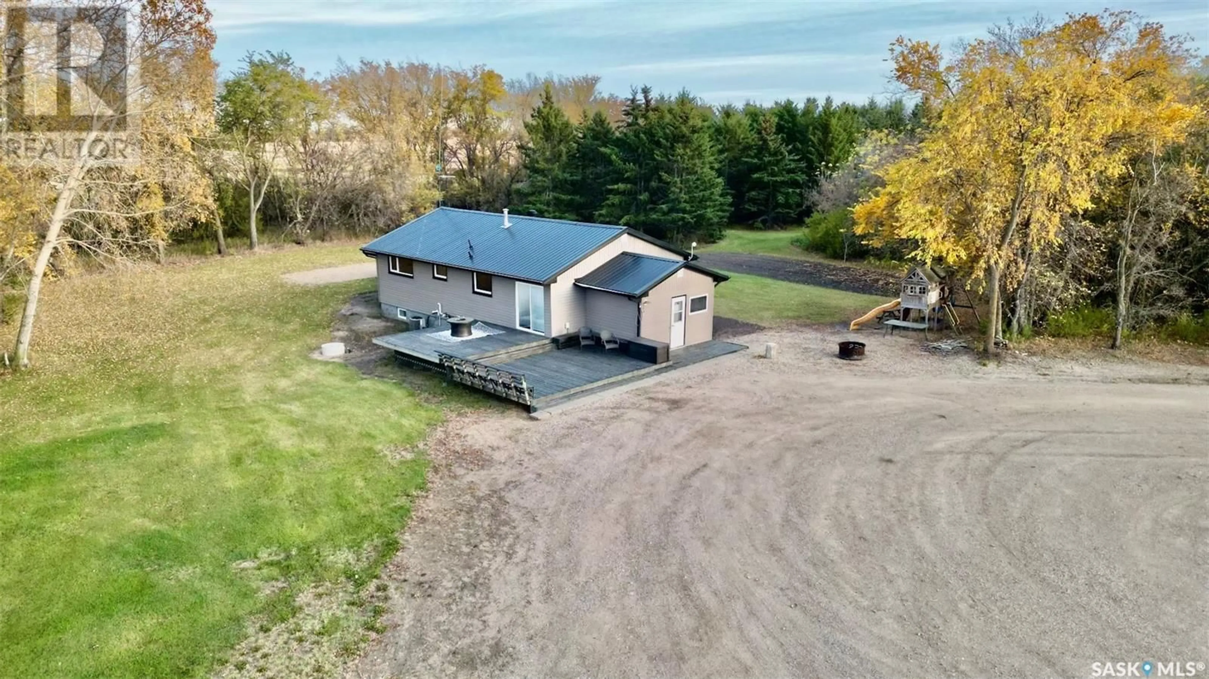 A pic from outside/outdoor area/front of a property/back of a property/a pic from drone, building for EMERALD ACREAGE, Emerald Rm No. 277 Saskatchewan S0A1A0